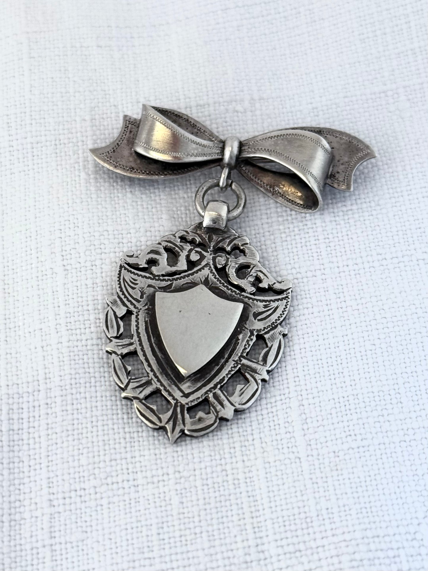 .1940s .1950s .925 Awards sterling silver Sweetheart bow and fob medallion brooch
