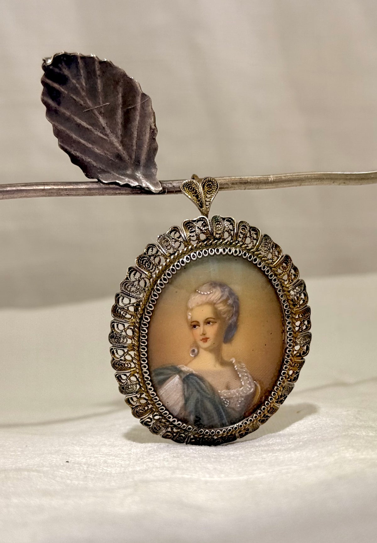 .1930s .1940s .800 Artist gold and silver incredible hand painted miniature Baroque revival portrait in fine silver filigree brooch and pendant