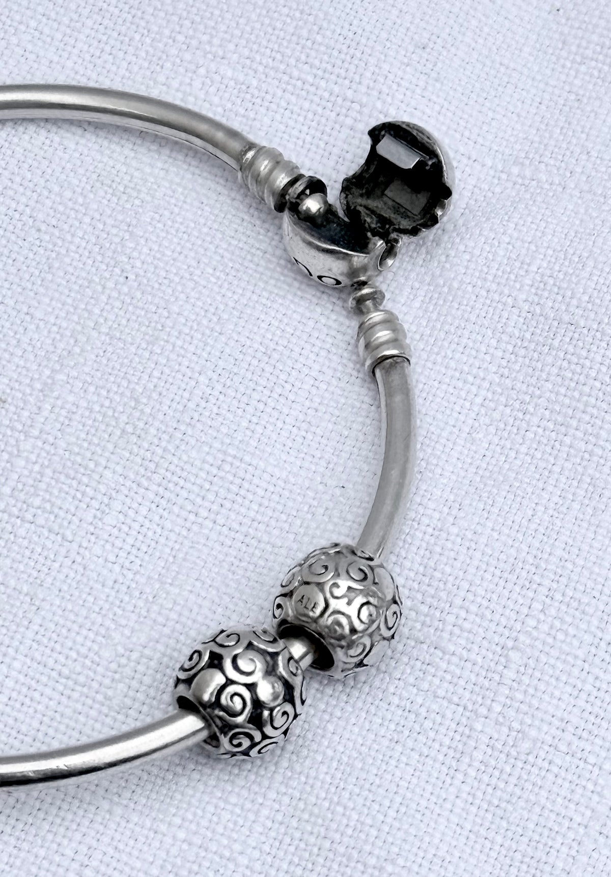 .925 signed Pandora Moments classic sterling silver ball clasp bangle with two screw on filigree form ball charms