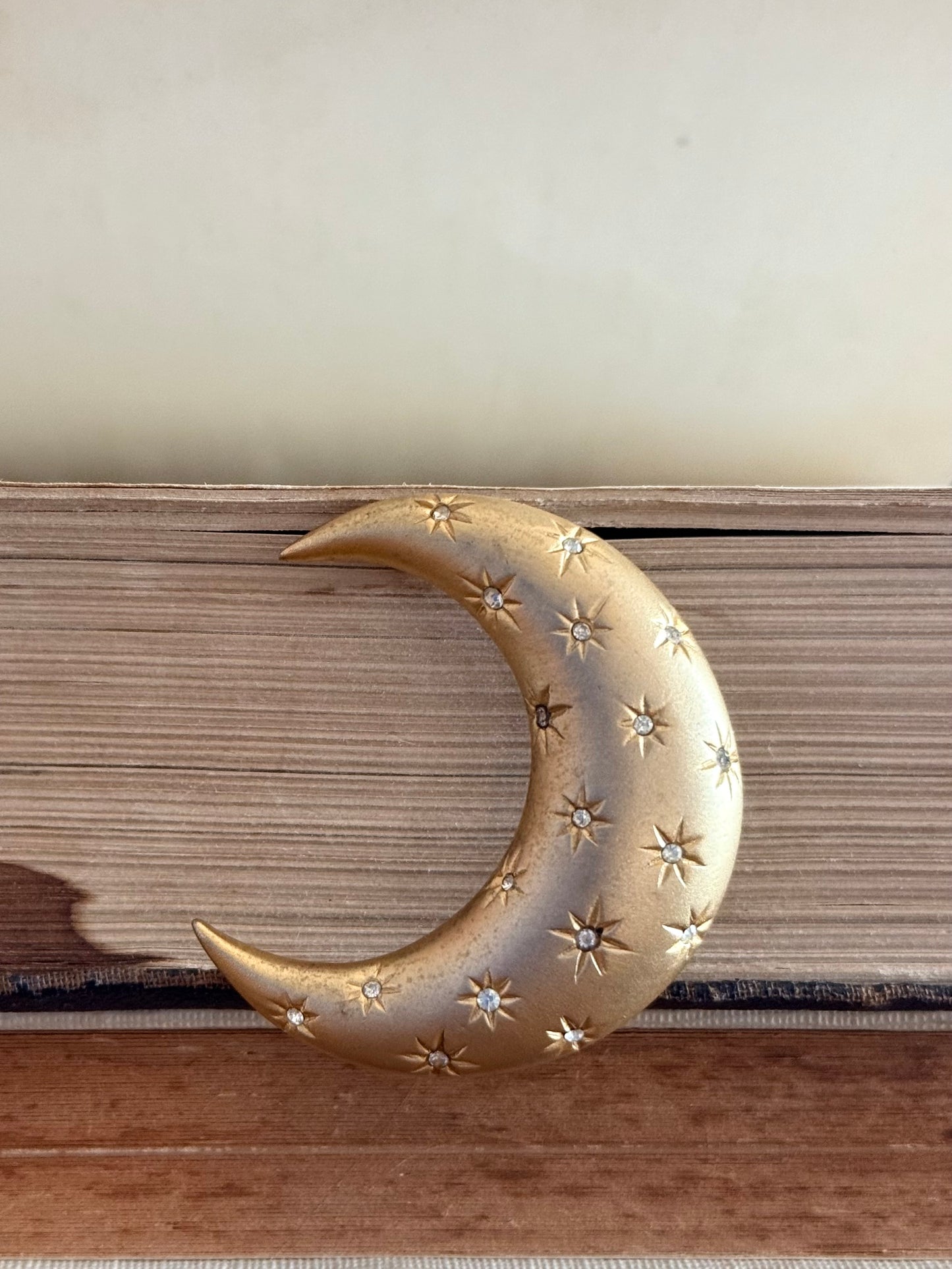 .1980s crescent moon puffy gold diamanté star accent costume moon brooch