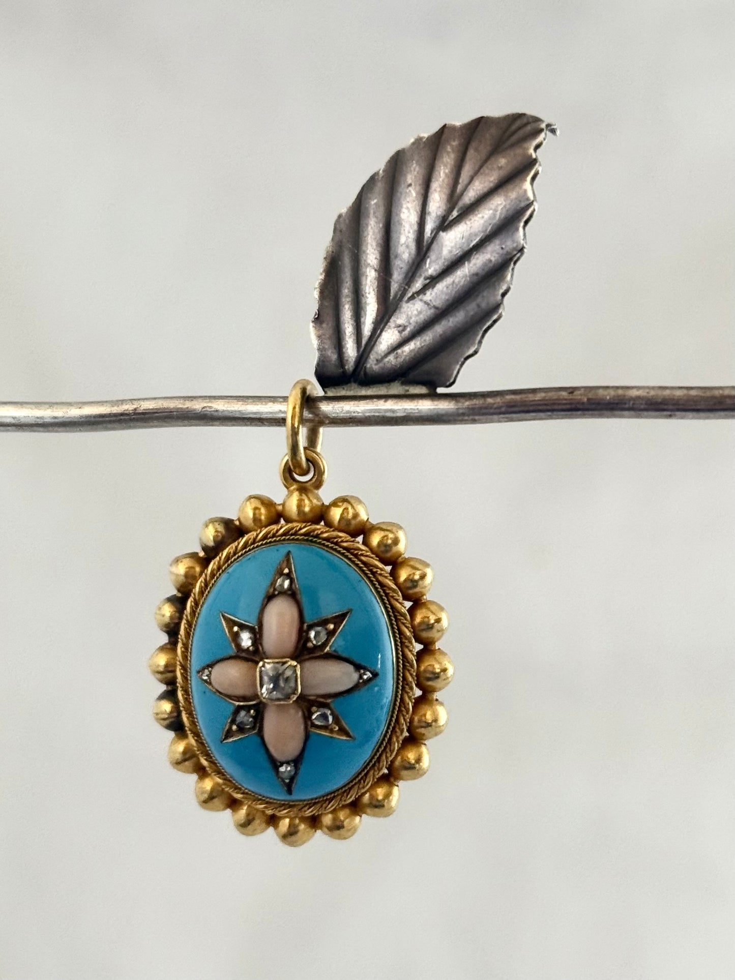 .15ct .1850s .1860s antique Victorian Yellow Gold Cushion cut Diamond Rose Cut Diamond star starburst Angel Coral and Blue Enamel Etruscan Revival Beaded border Mourning locket pendant