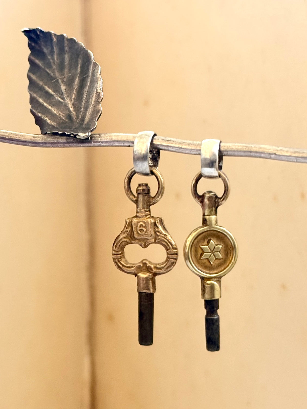 .1900s antique brass watch winder key number 4 collectors silver fob pendant