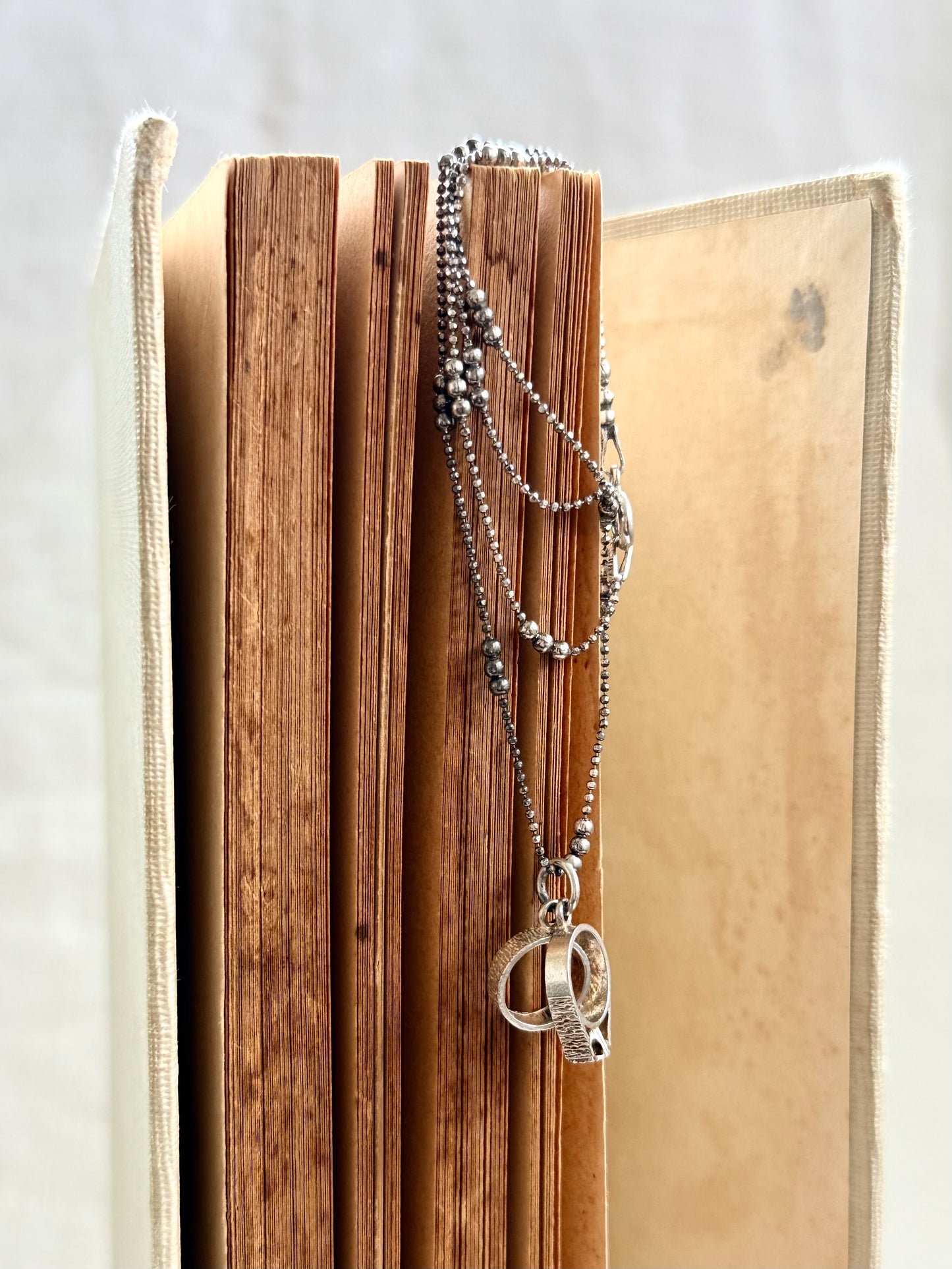.1970s .925 Miniature wedding ring commitment ring silver retro diamanté ring token charm pendant