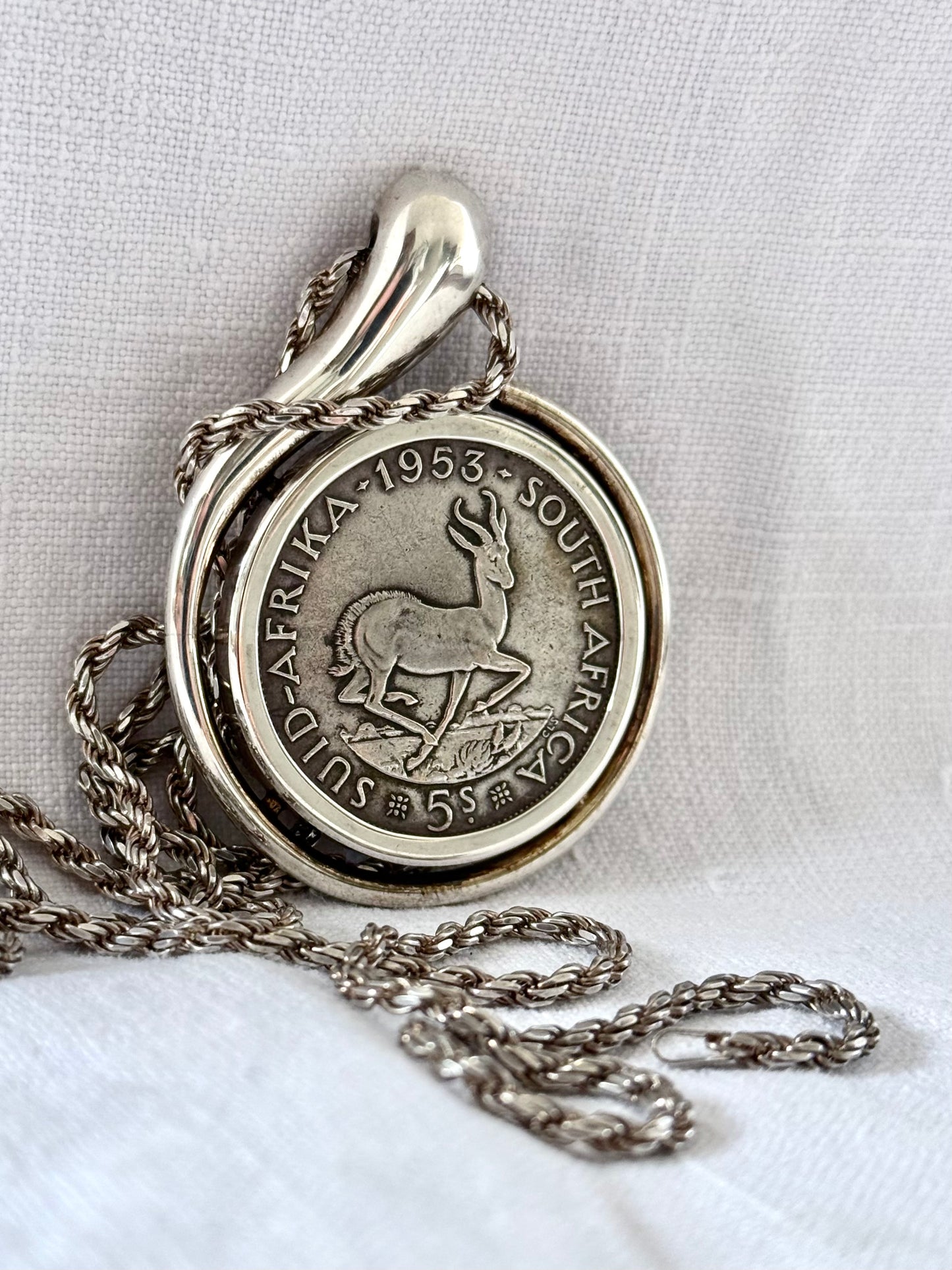 .1953 .500 silver and .925 silver large modernist statement South African 5 Shillings Silver Coin pendant and long rope weave chain necklace