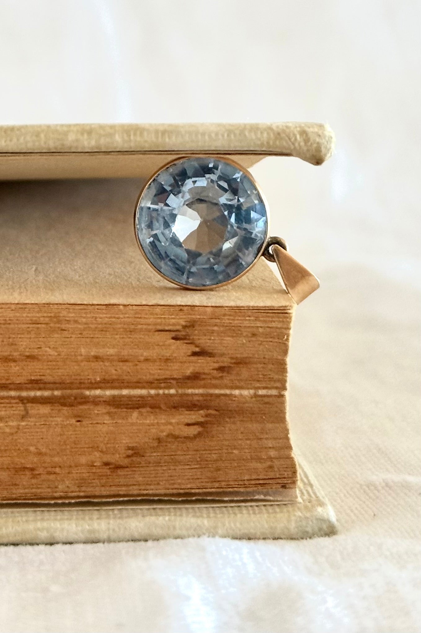 .375 6.94ct Aquamarine Bezel set modernist gold pendant