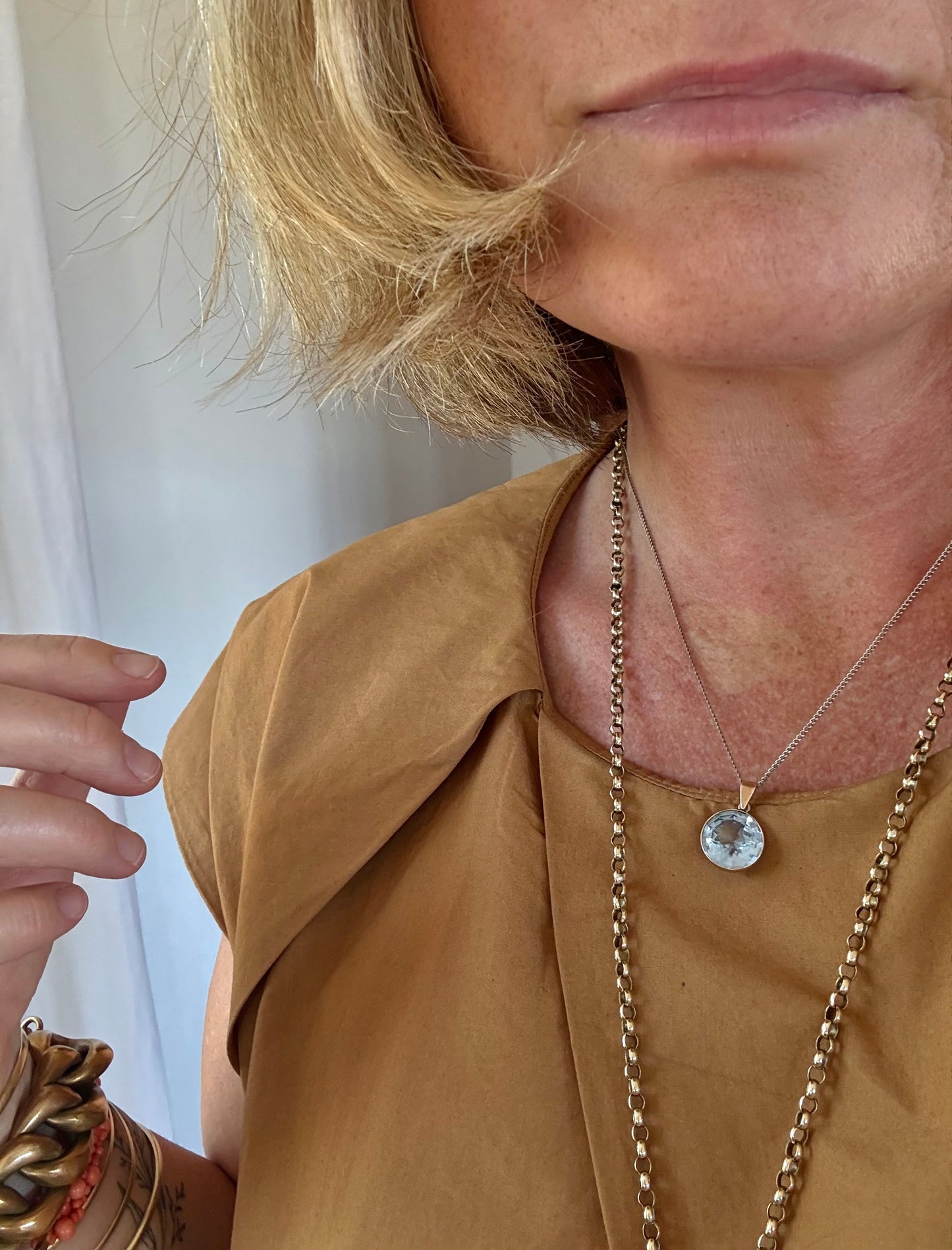 .375 6.94ct Aquamarine Bezel set modernist gold pendant