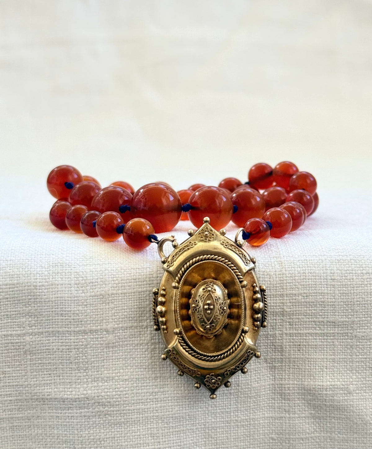 .1800s .375 .9ct gold Antique decorative fine Etruscan revival Victorian ornate gold oval pendant on luxury Carnelian bead graduated gemstone necklace setting