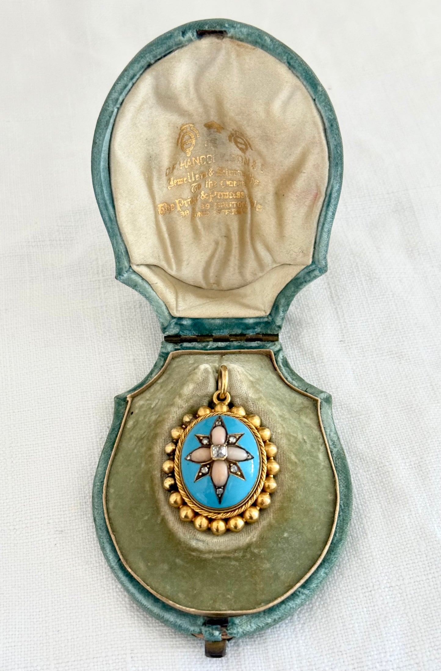 .15ct .1850s .1860s antique Victorian Yellow Gold Cushion cut Diamond Rose Cut Diamond star starburst Angel Coral and Blue Enamel Etruscan Revival Beaded border Mourning locket pendant