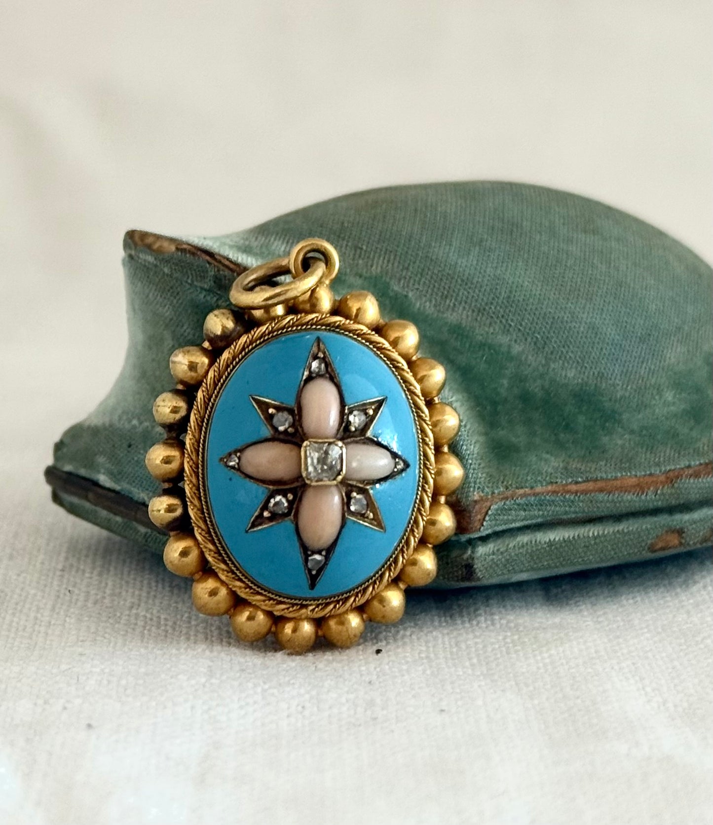 .15ct .1850s .1860s antique Victorian Yellow Gold Cushion cut Diamond Rose Cut Diamond star starburst Angel Coral and Blue Enamel Etruscan Revival Beaded border Mourning locket pendant