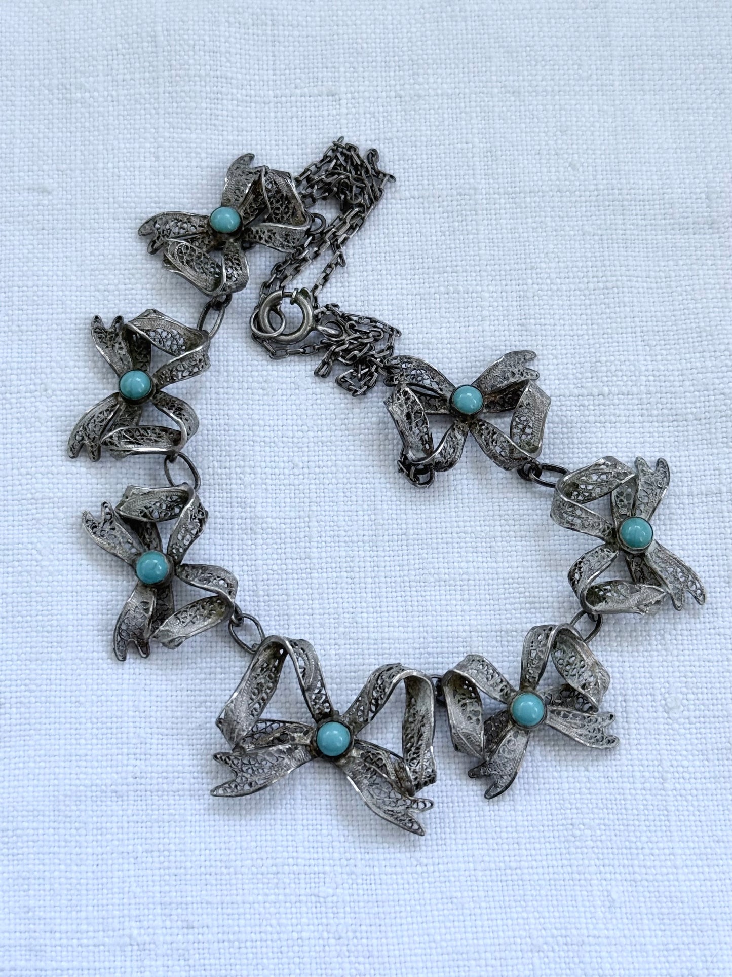 .1900s .1930s .916 silver vintage open work filigree wirework Bow Ribbon chain necklace