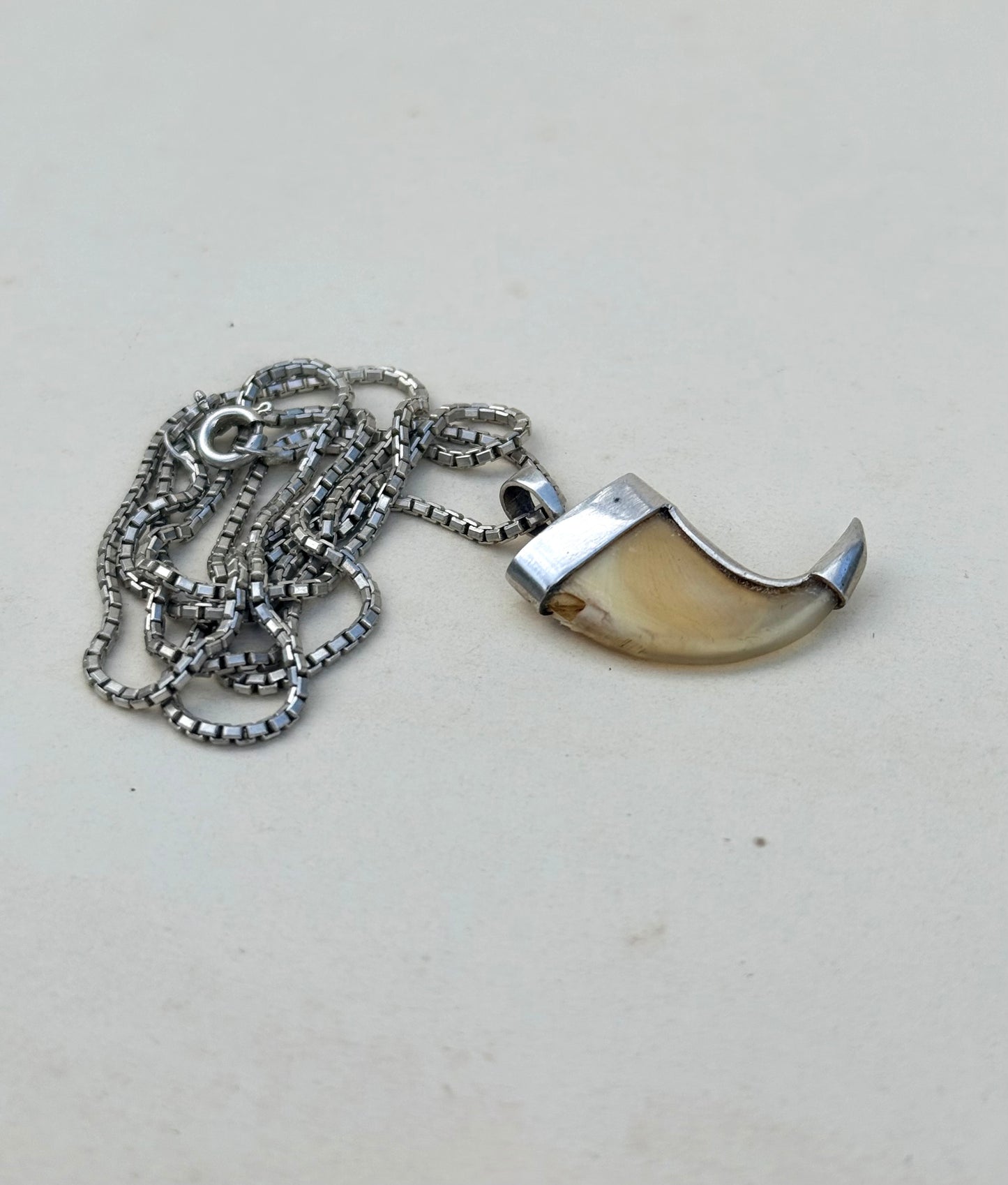 .925 silver Victorian revival lion claw pendant