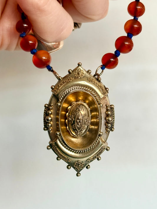 .1800s .375 .9ct gold Antique decorative fine Etruscan revival Victorian ornate gold oval pendant on luxury Carnelian bead graduated gemstone necklace setting