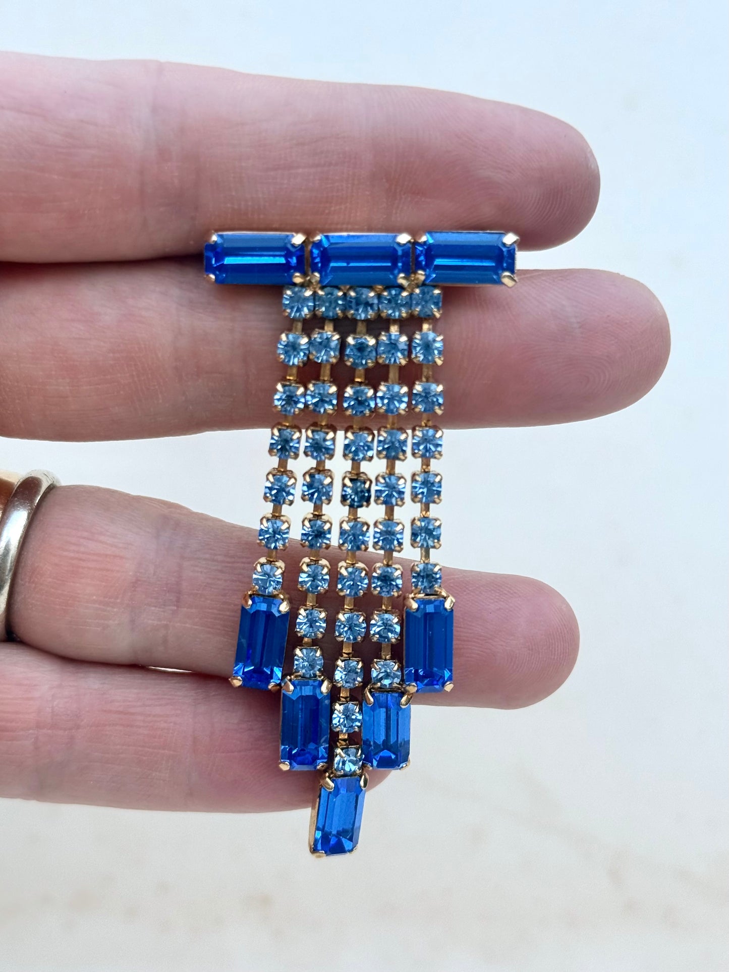 .1920s .1940s revival Art Deco style Blue Diamante paste waterfall dazzle costume brooch lapel pin