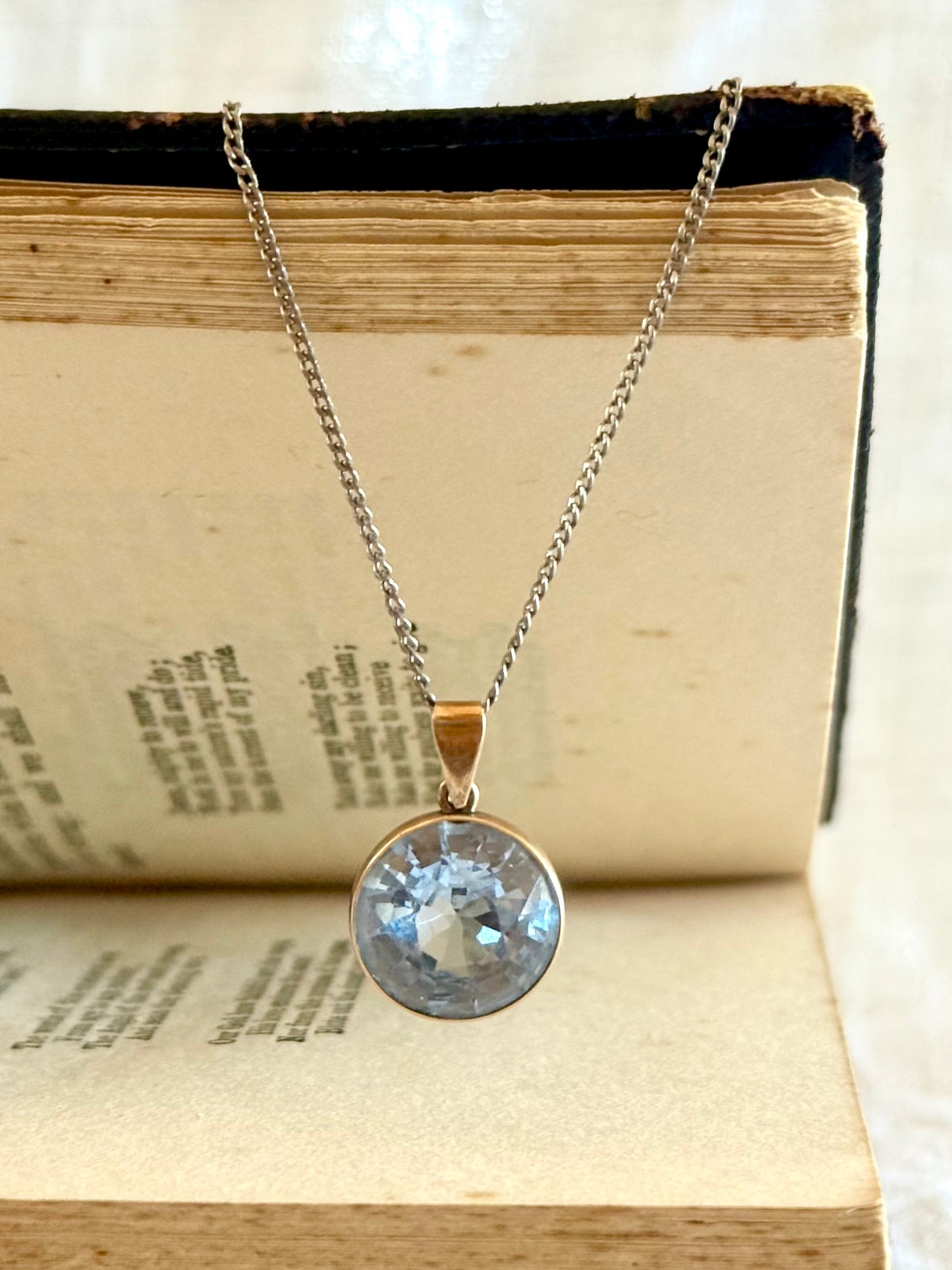 .375 6.94ct Aquamarine Bezel set modernist gold pendant