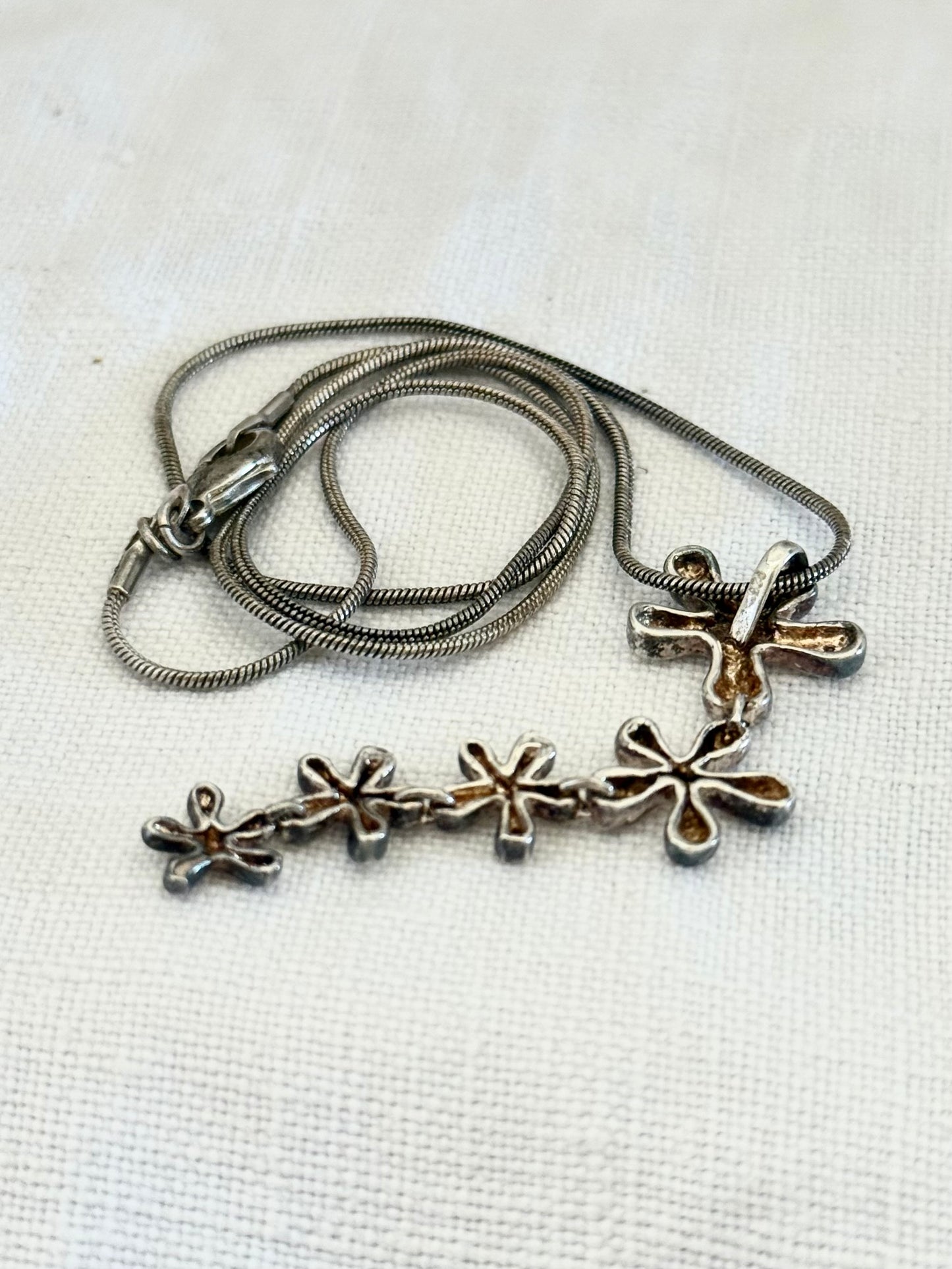 .925 .1950s revival modernist sterling silver floral waterfall drop pendant silver snake chain