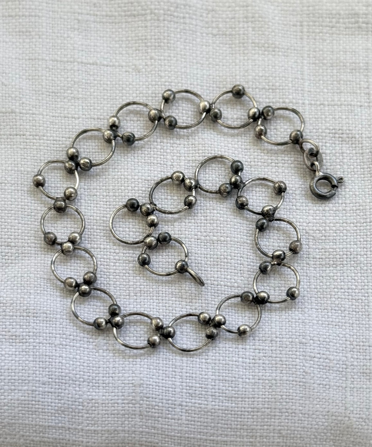 .21cm .925 articulated circular circle modernist silver link chain bracelet