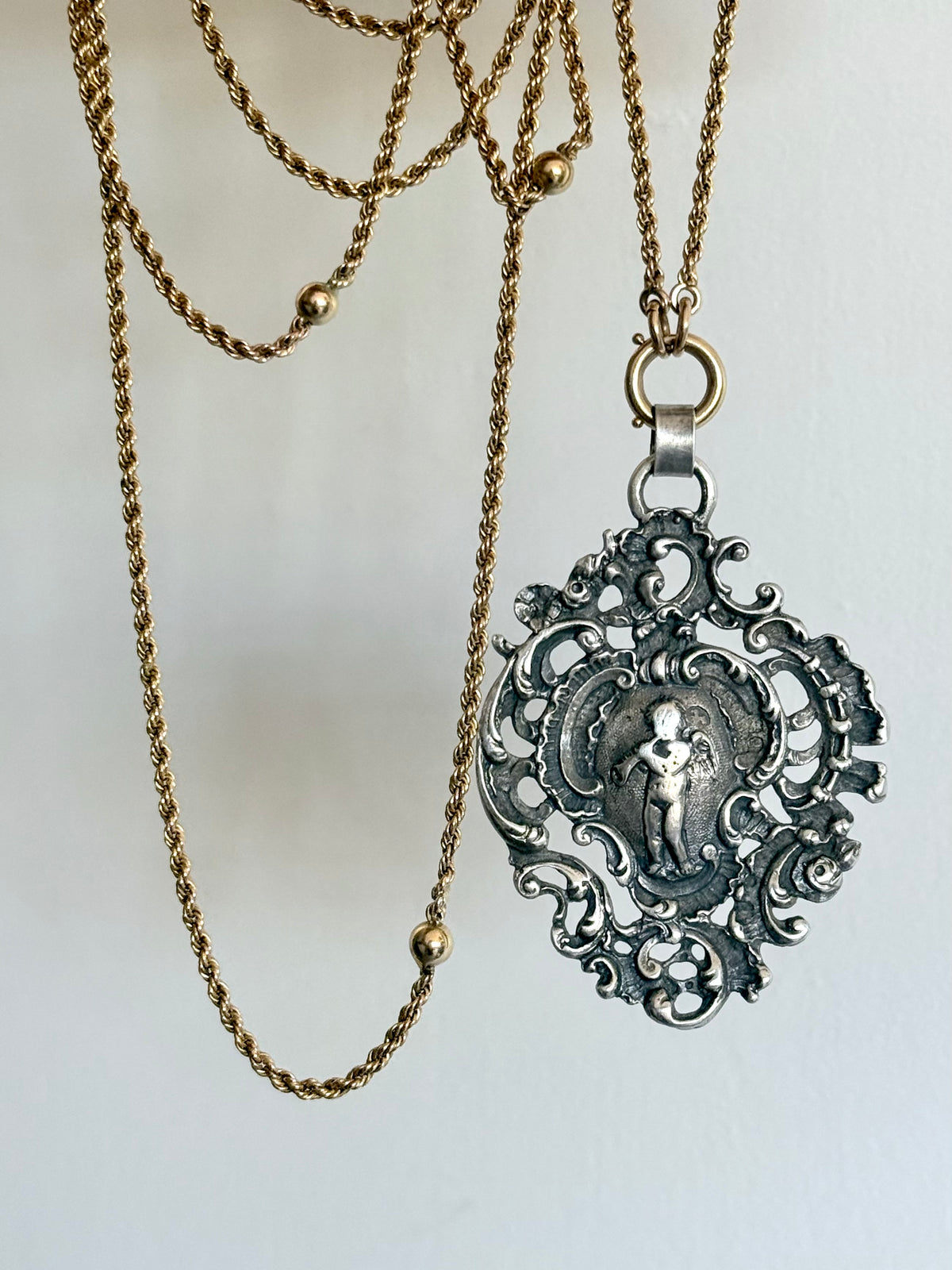 .1896 .925 antique Baroque revival left angel trumpet playing cherub filigree large sterling silver Victorian hallmarked silver pendant