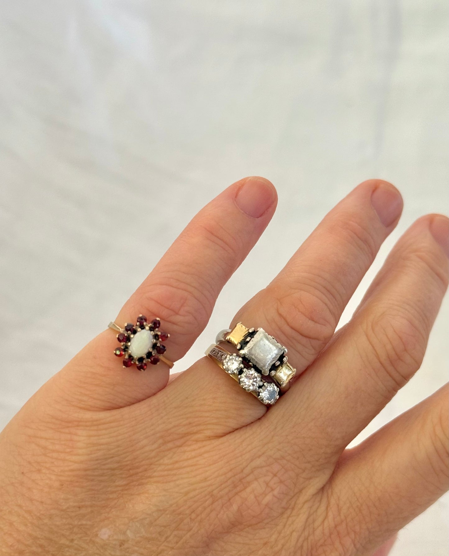 1930s .1940s .375 .9ct gold 1 opal 10 garnet 9ct yellow gold gemstone rosette halo flower cluster cocktail dress ring