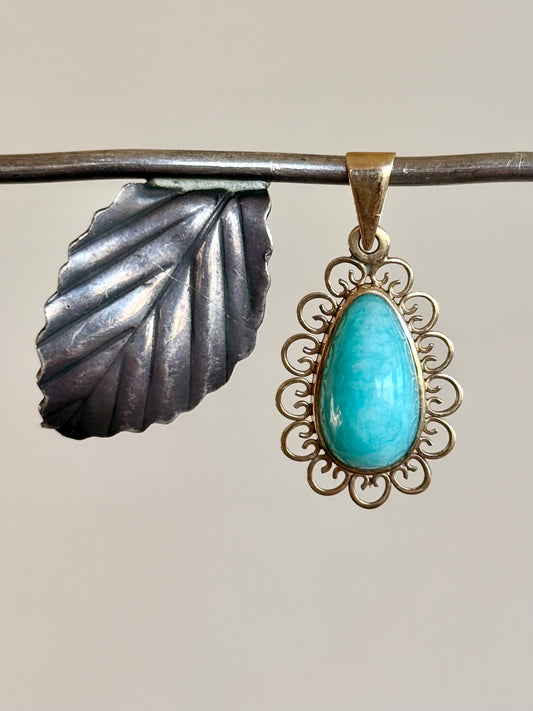 .1940s .1950s .375 .9ct gold Amazonite vintage yellow gold modernist teardrop pear shaped filigree scroll form frame blue green gemstone drop pendant.