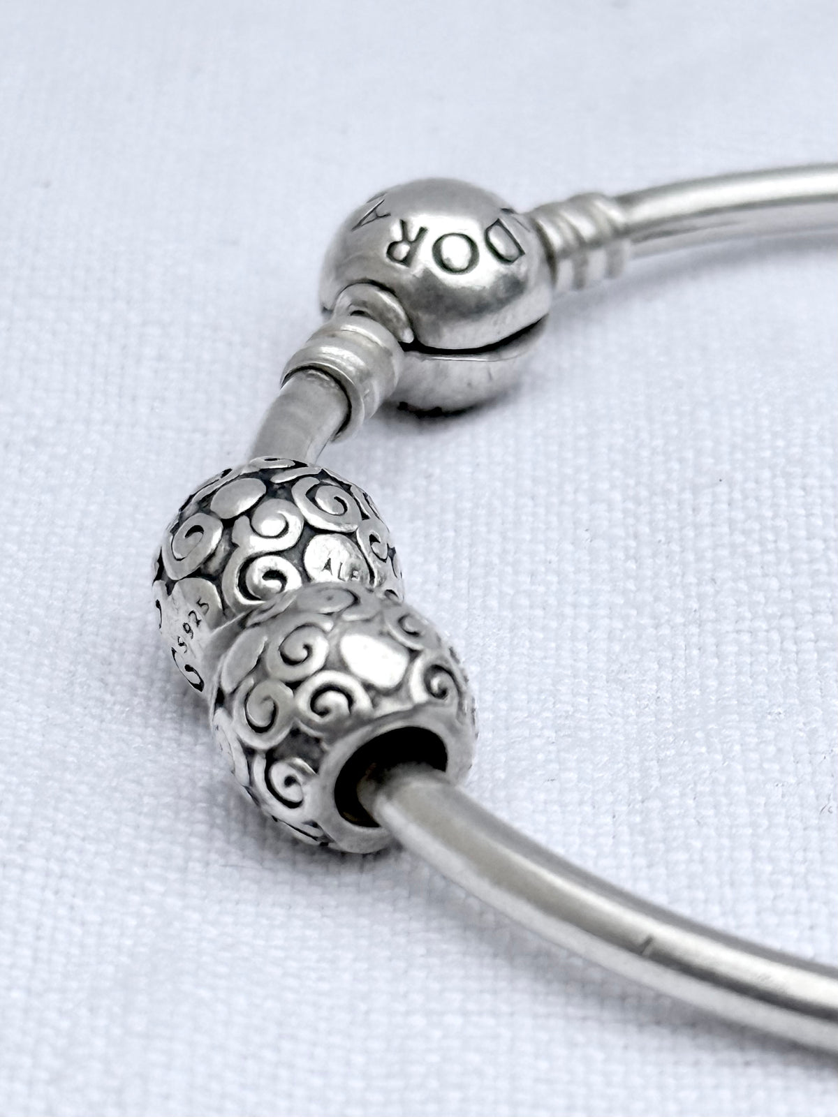 .925 signed Pandora Moments classic sterling silver ball clasp bangle with two screw on filigree form ball charms