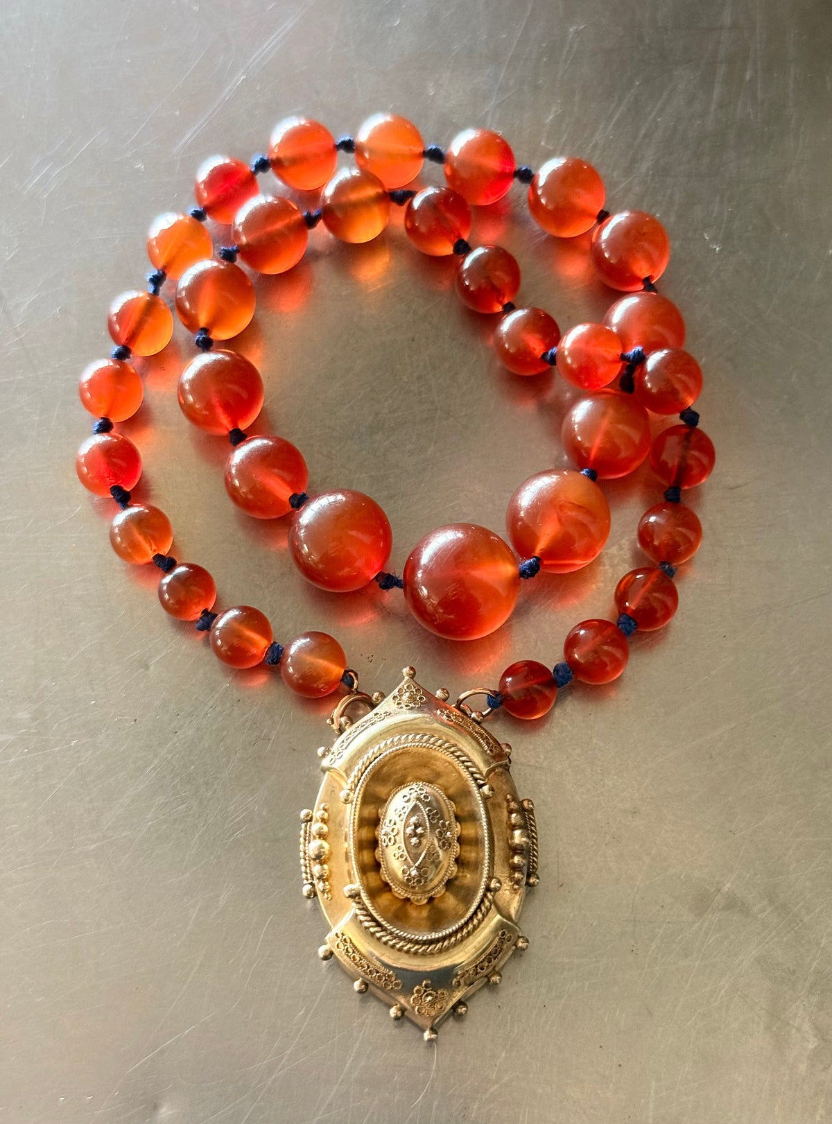 .1800s .375 .9ct gold Antique decorative fine Etruscan revival Victorian ornate gold oval pendant on luxury Carnelian bead graduated gemstone necklace setting