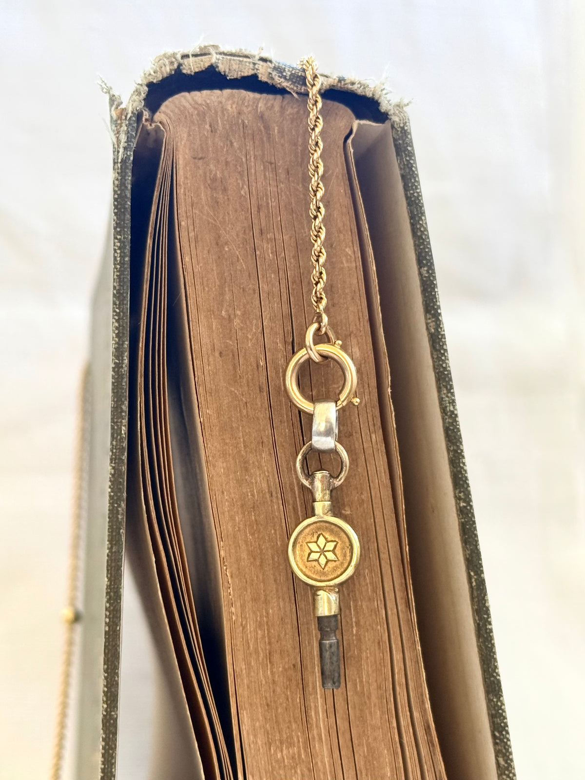 .1900s antique brass watch winder key number 4 collectors silver fob pendant