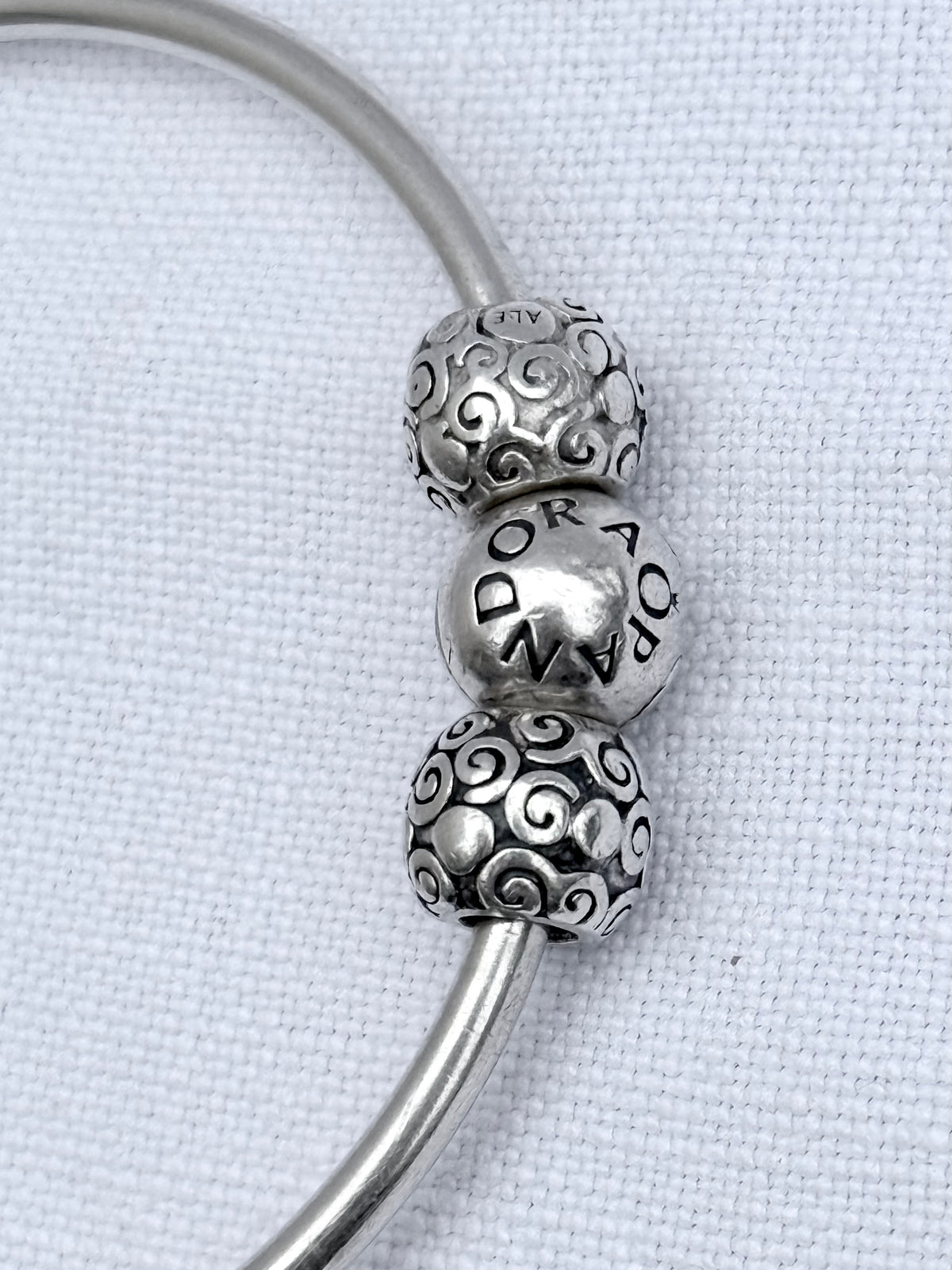 .925 signed Pandora Moments classic sterling silver ball clasp bangle with two screw on filigree form ball charms