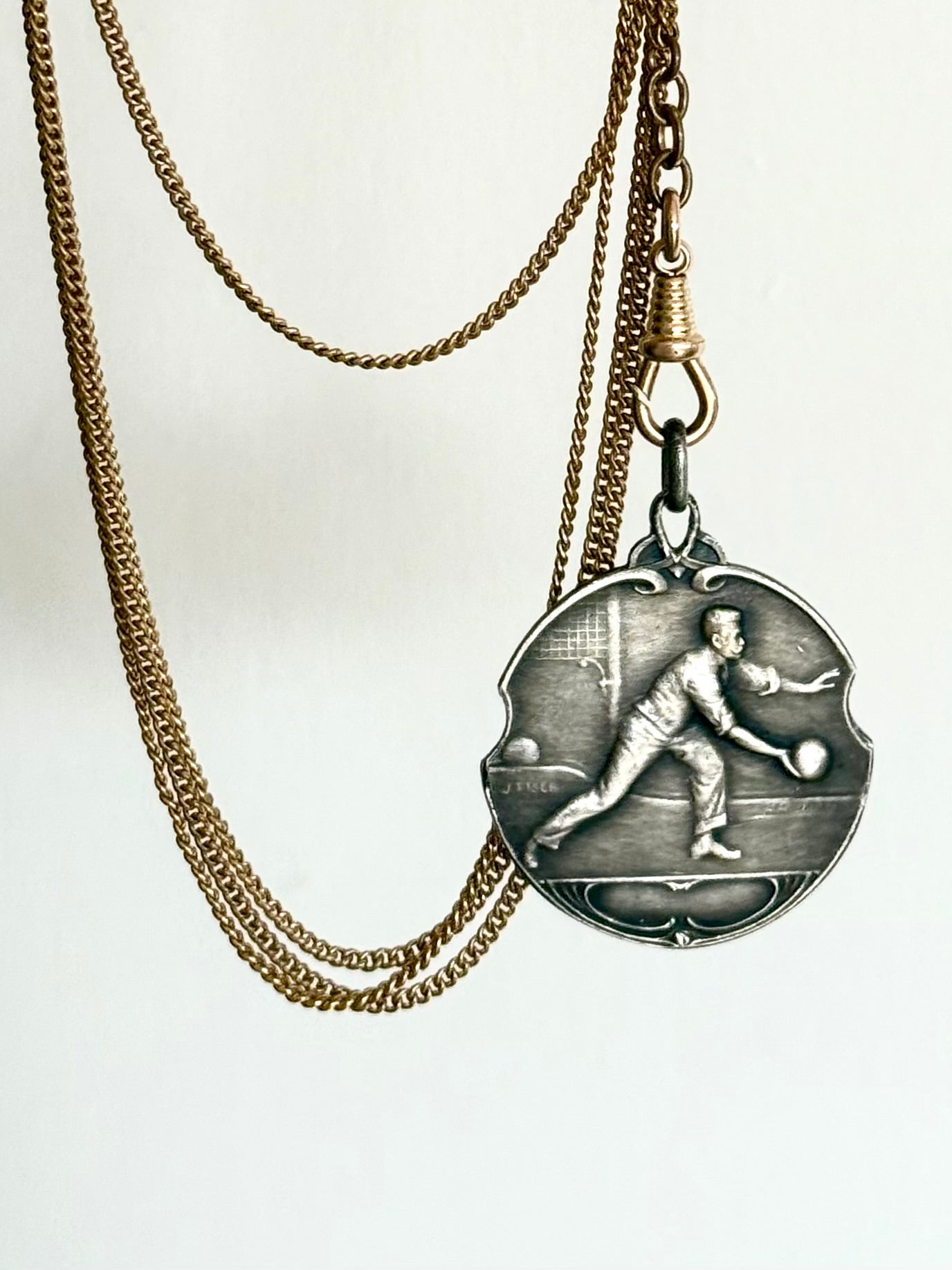 .1920s Art Nouveau Bowler sports medallion fob pendant