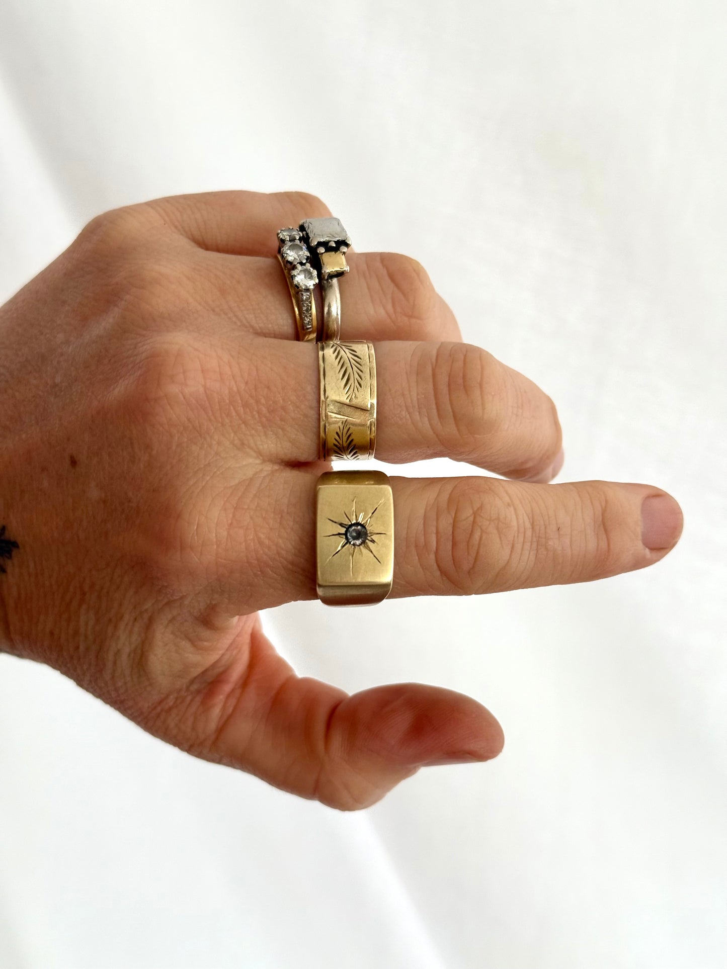 .1970s Gold tone Brass solid chunky signet ring with star burst diamond cut gem