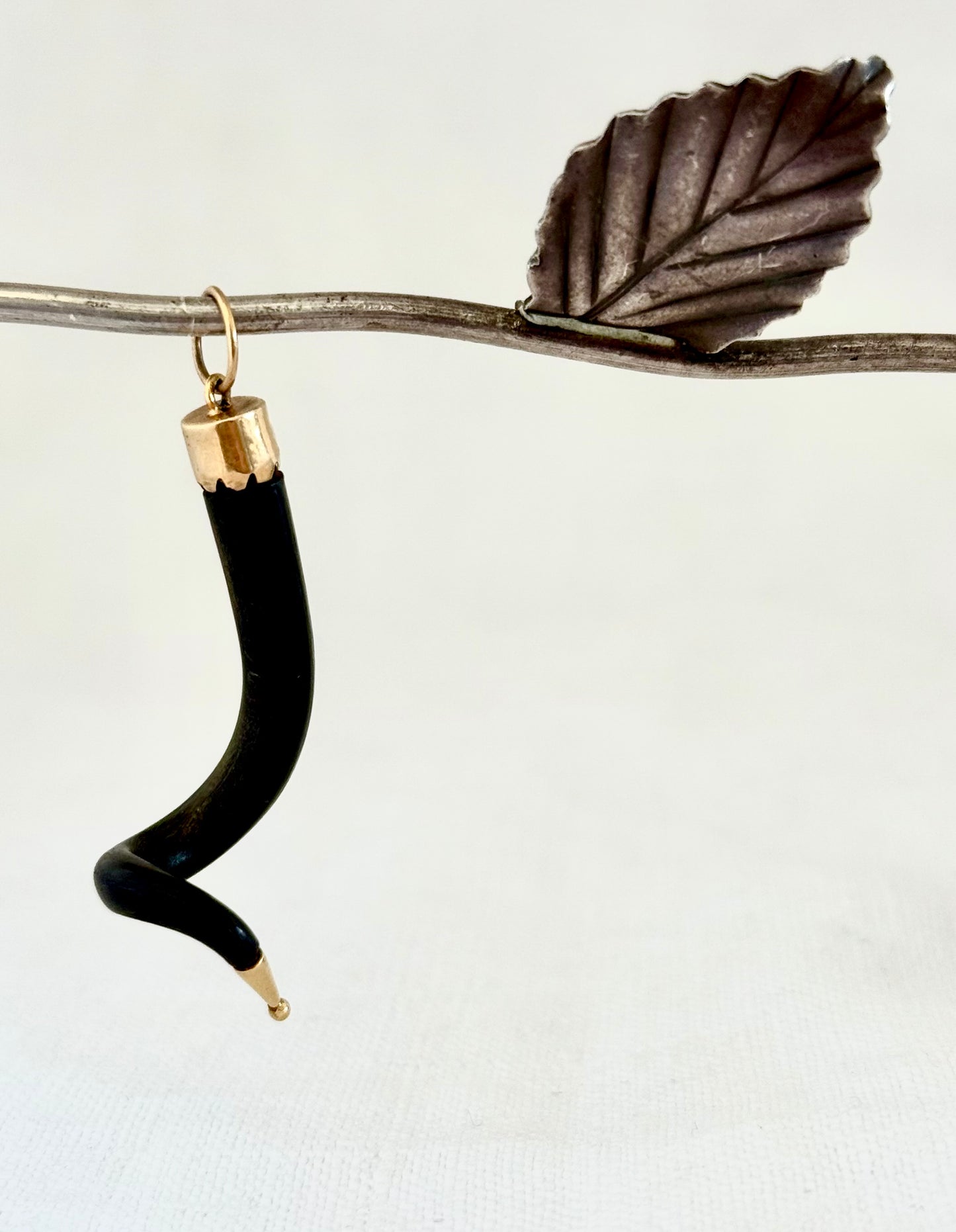 .14ct .1880s .1920s .585 gold and natural spiral twist horn amulet pendant