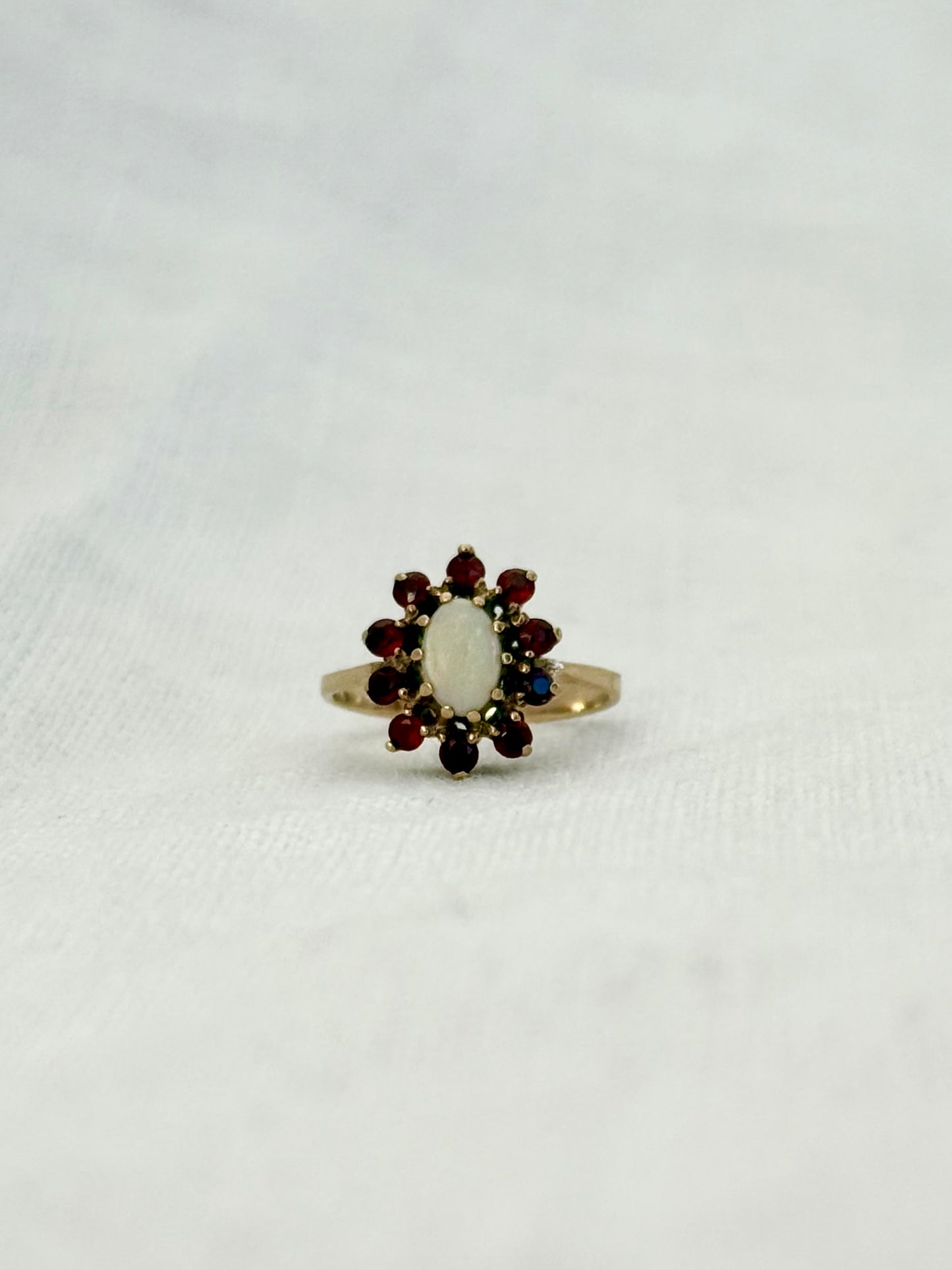 1930s .1940s .375 .9ct gold 1 opal 10 garnet 9ct yellow gold gemstone rosette halo flower cluster cocktail dress ring