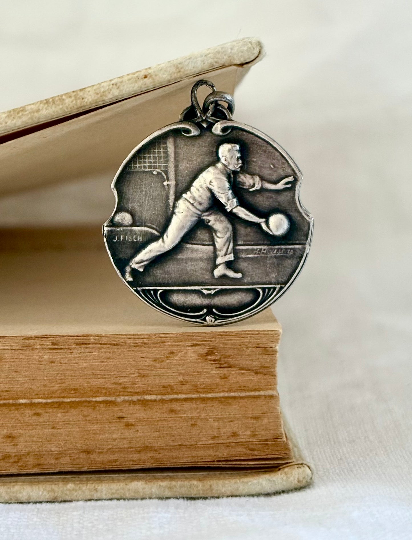 .1920s Art Nouveau Bowler sports medallion fob pendant