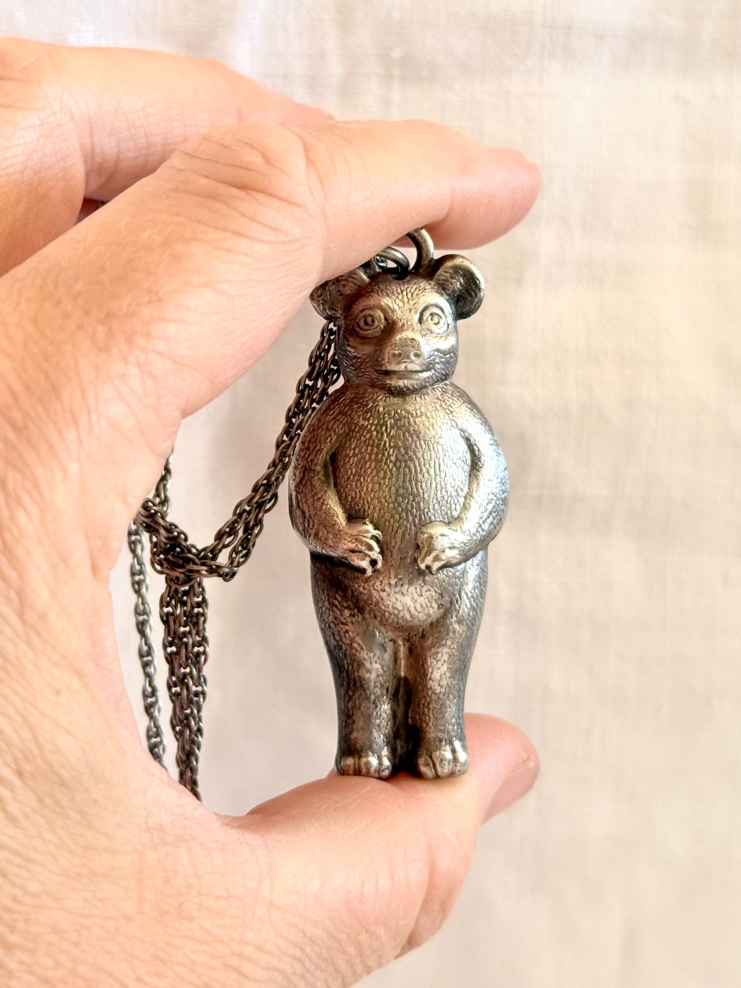 .1910s .1920s Art Nouveau figural collectors bear rattle baby rattle pendant on long silver chain