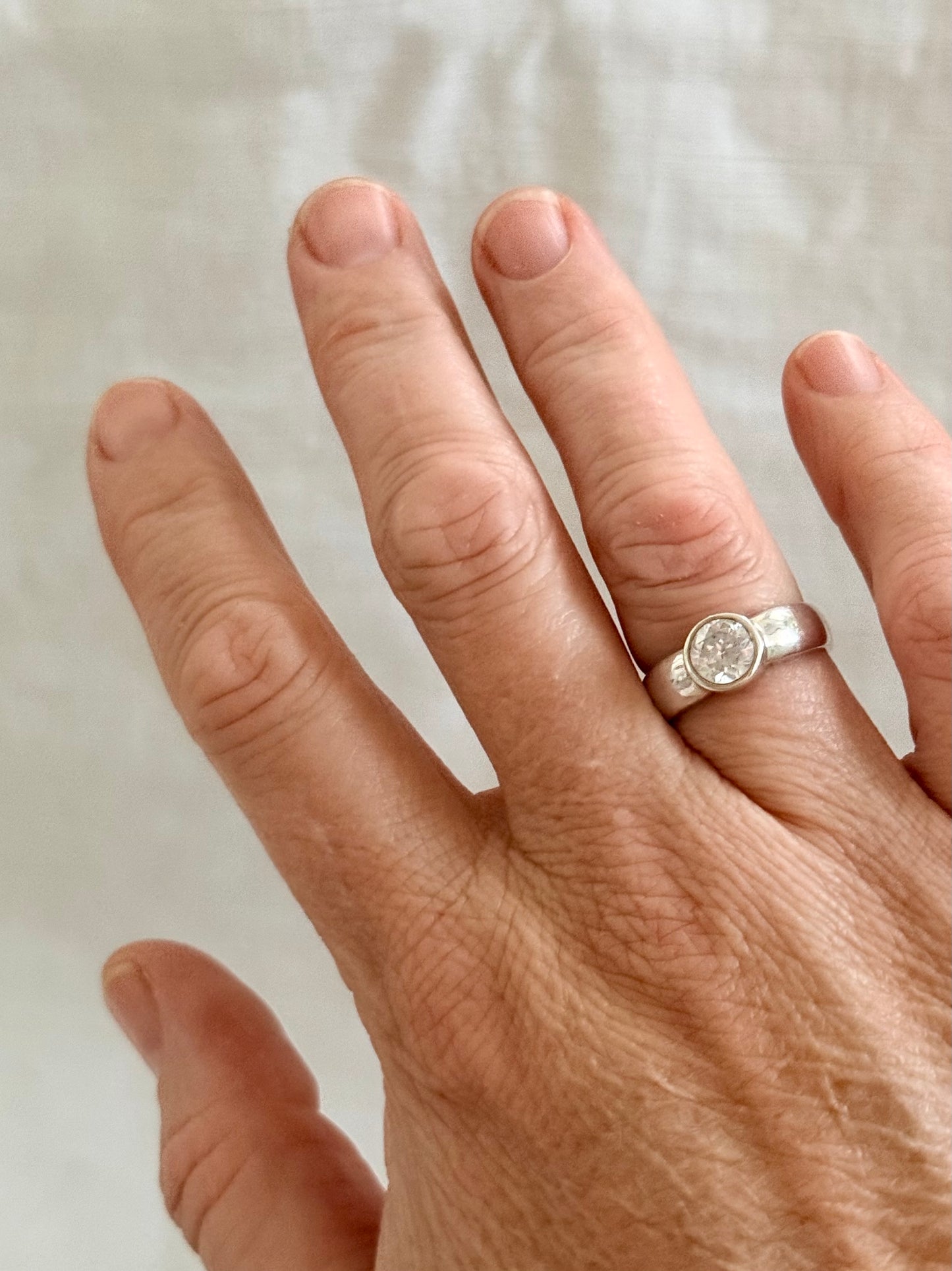 .925 classic large solitaire clear gemstone in wide set bezel set silver engagement style ring