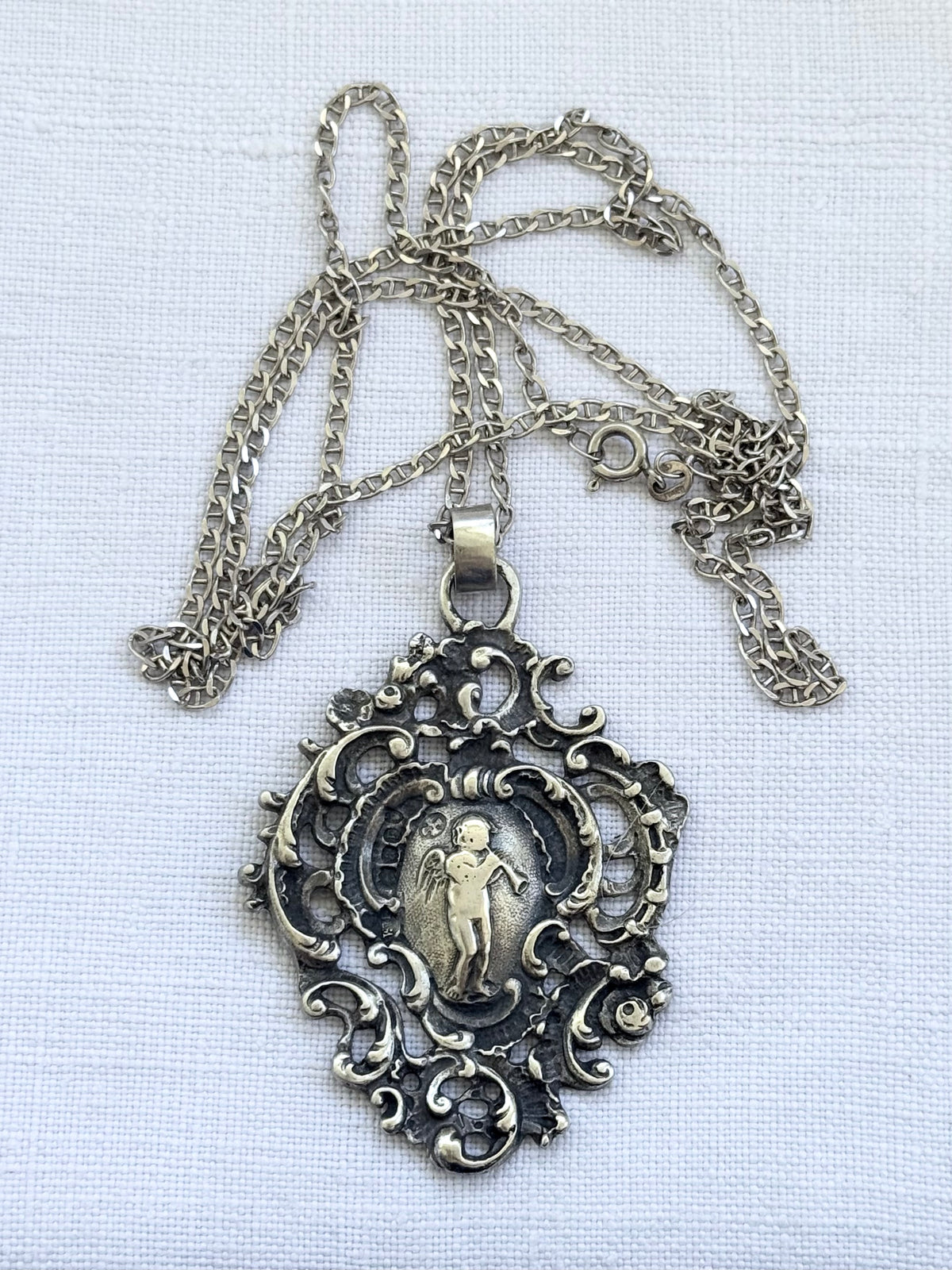 .1896 .925 antique Baroque revival right facing angel trumpet playing cherub filigree large sterling silver Victorian hallmarked silver pendant
