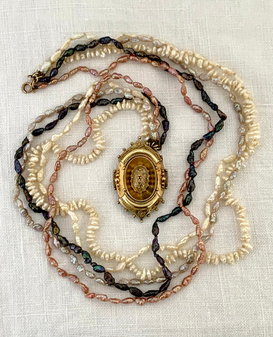 1800s 9ct gold Antique Etruscan revival Victorian yellow gold high detailed ornate oval pendant on dreamy shell coloured multi string 5 x string fresh water rice pearl necklace