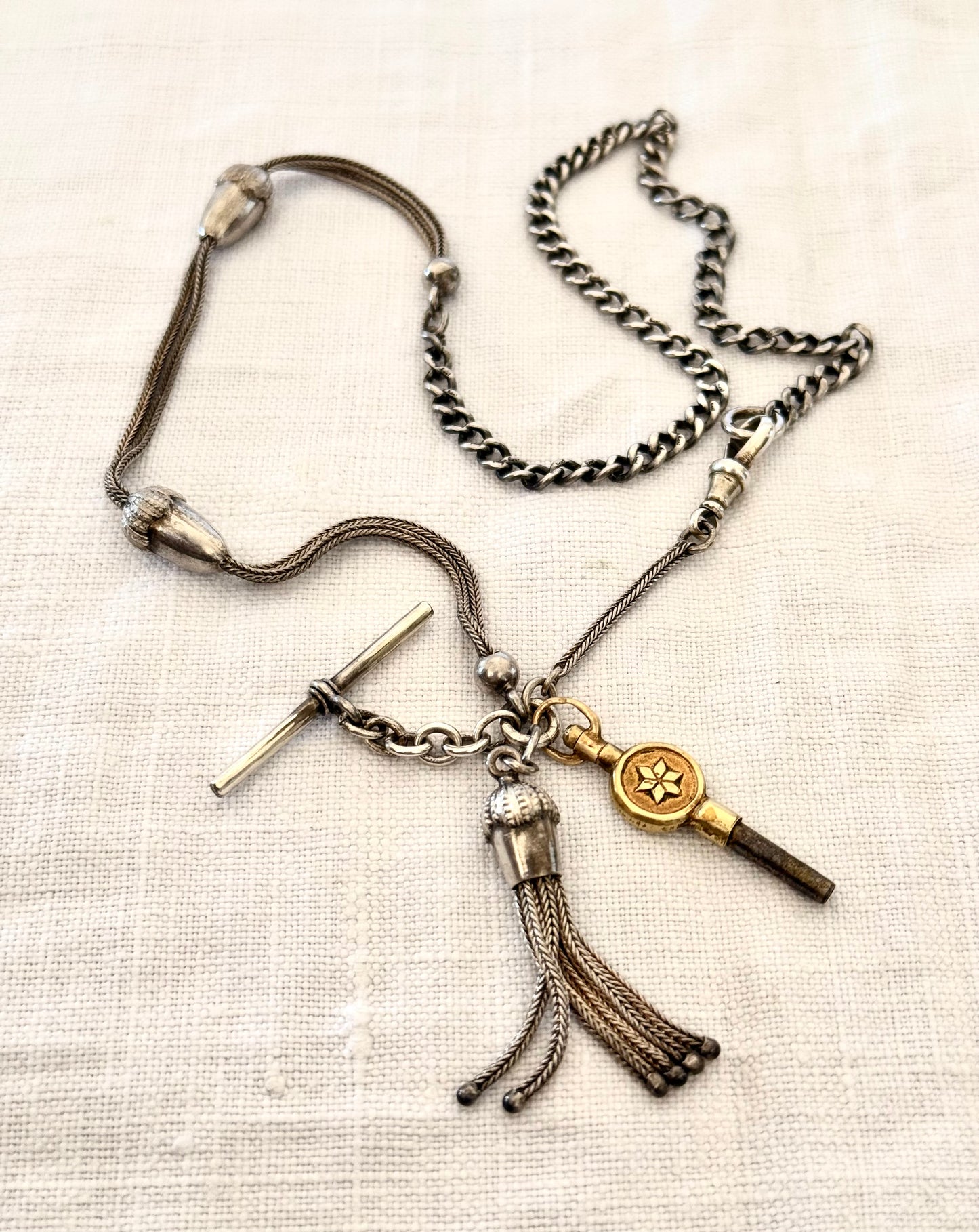 .1890s .1910s .925 antique rare Belle Epoque fancy Acorn lucky token Albertina chain hallmark silver fob chain necklace with Etruscan revival tassel fob and brass watch winder key dangles