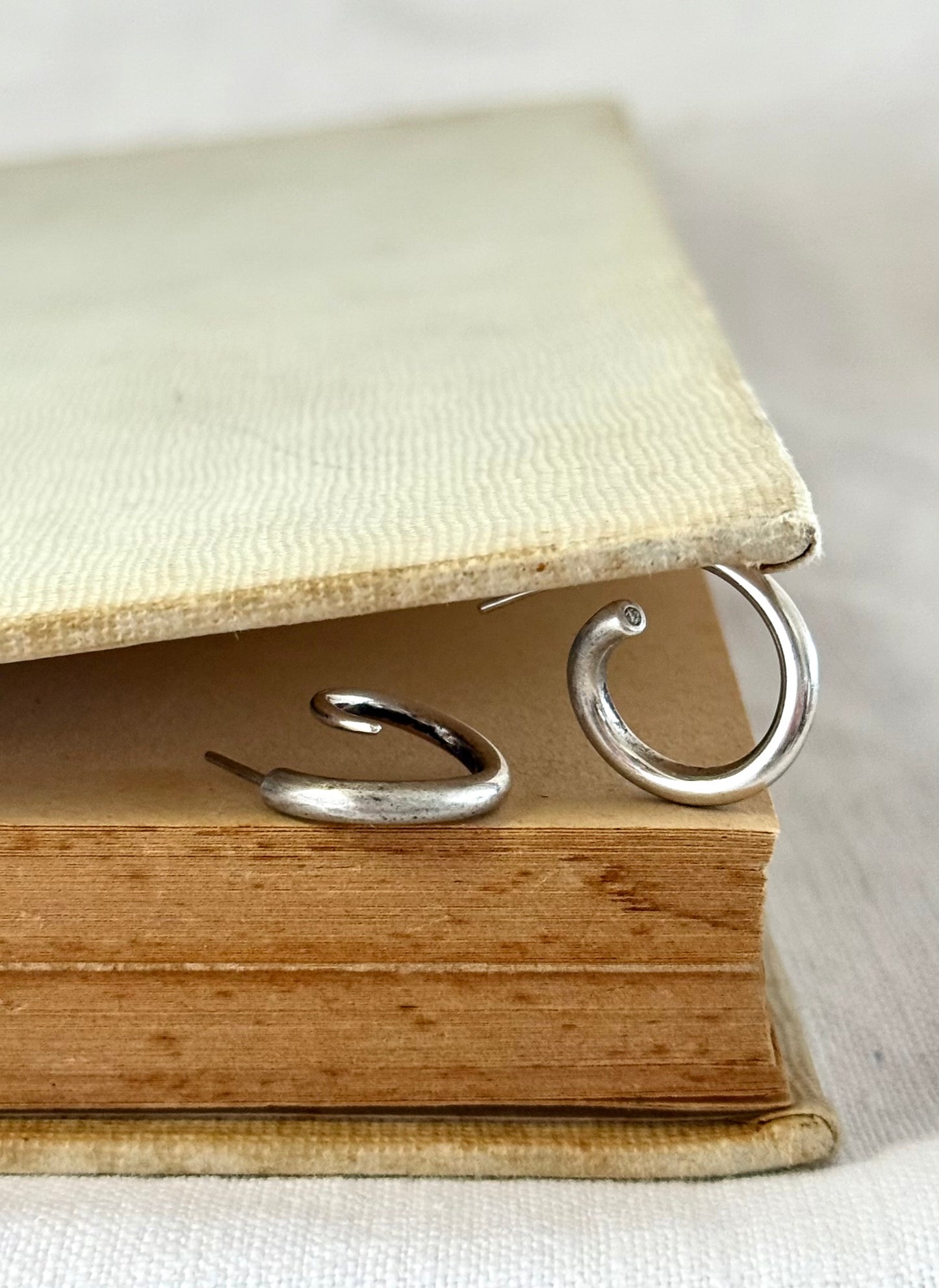 .925 silver diamond accent artisan made twist twirl mismatched wearable art solid silver luxury hoop post stud earrings