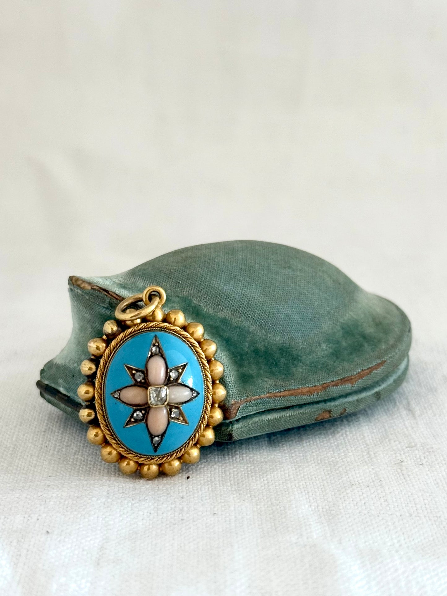 .15ct .1850s .1860s antique Victorian Yellow Gold Cushion cut Diamond Rose Cut Diamond star starburst Angel Coral and Blue Enamel Etruscan Revival Beaded border Mourning locket pendant