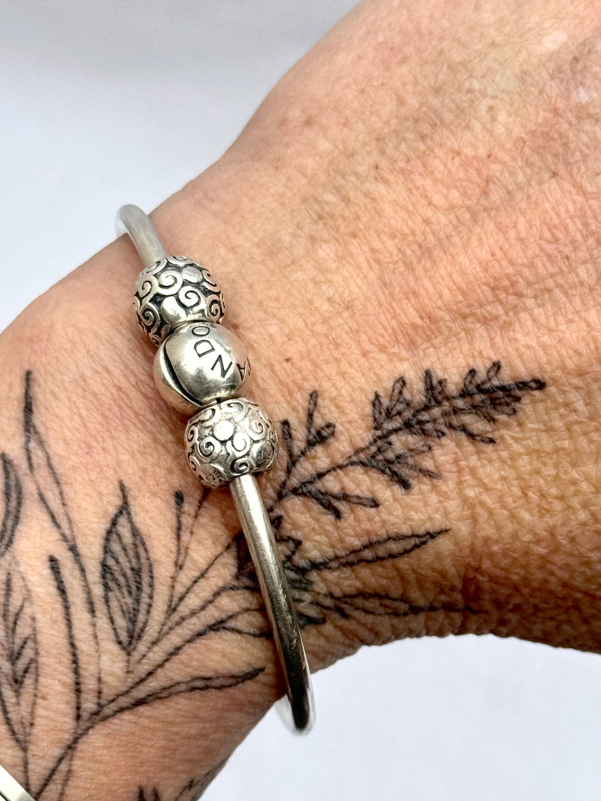 .925 signed Pandora Moments classic sterling silver ball clasp bangle with two screw on filigree form ball charms