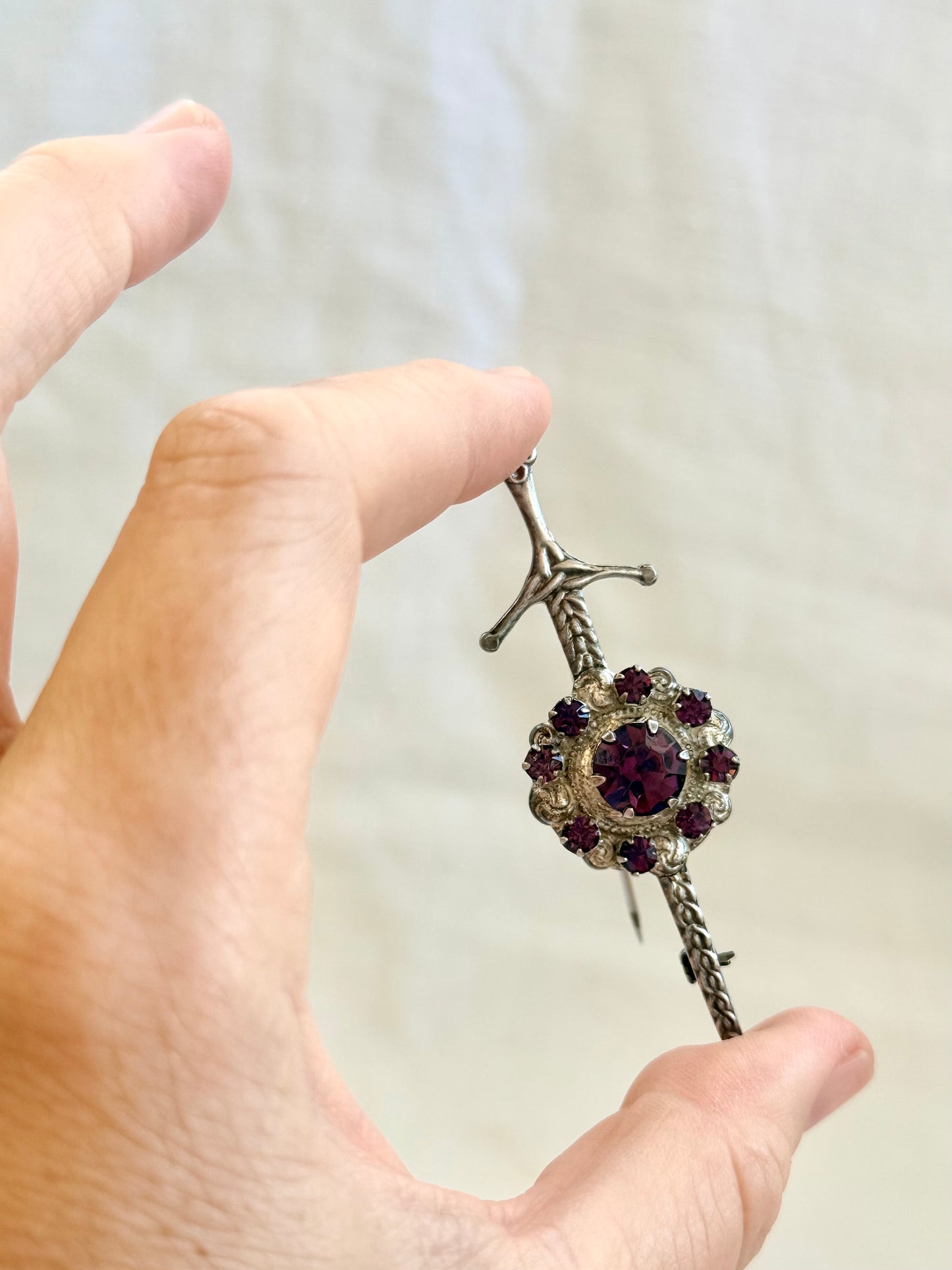 .1920s .1930s .925 Scottish silver Amethyst paste sword and shield brooch.