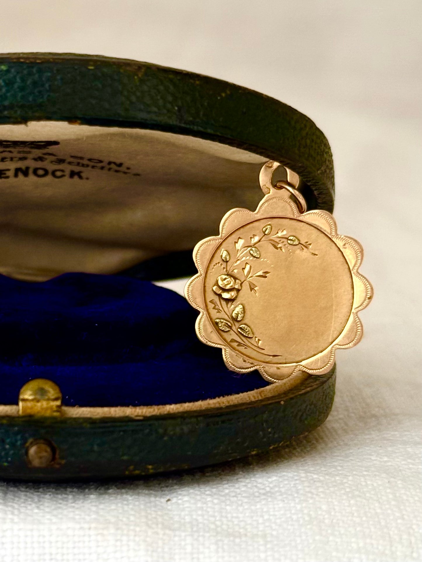 .18ct .1900s antique French Eagle head 18ct yellow gold green gold romantic scallop border Rose decal pendant