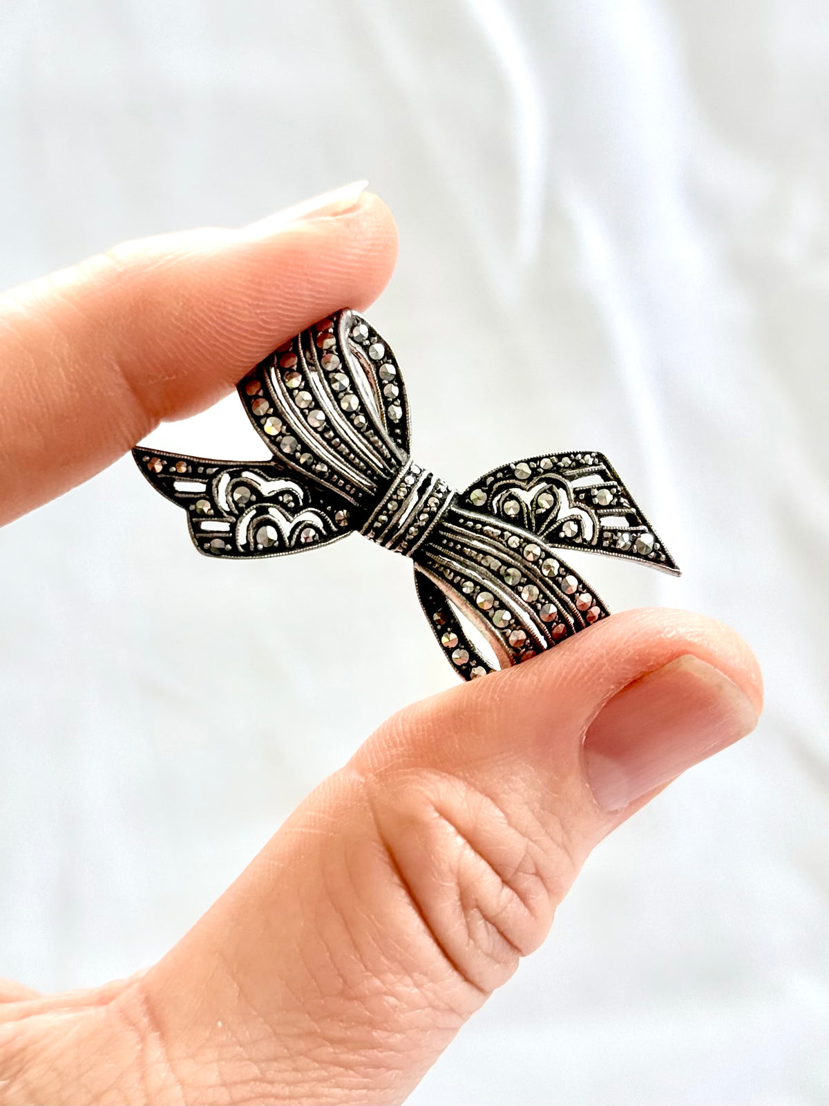.1920s .1930s .800 Art Deco French Paris Bow Ribbon silver Marcasite gemstone sweetheart brooch
