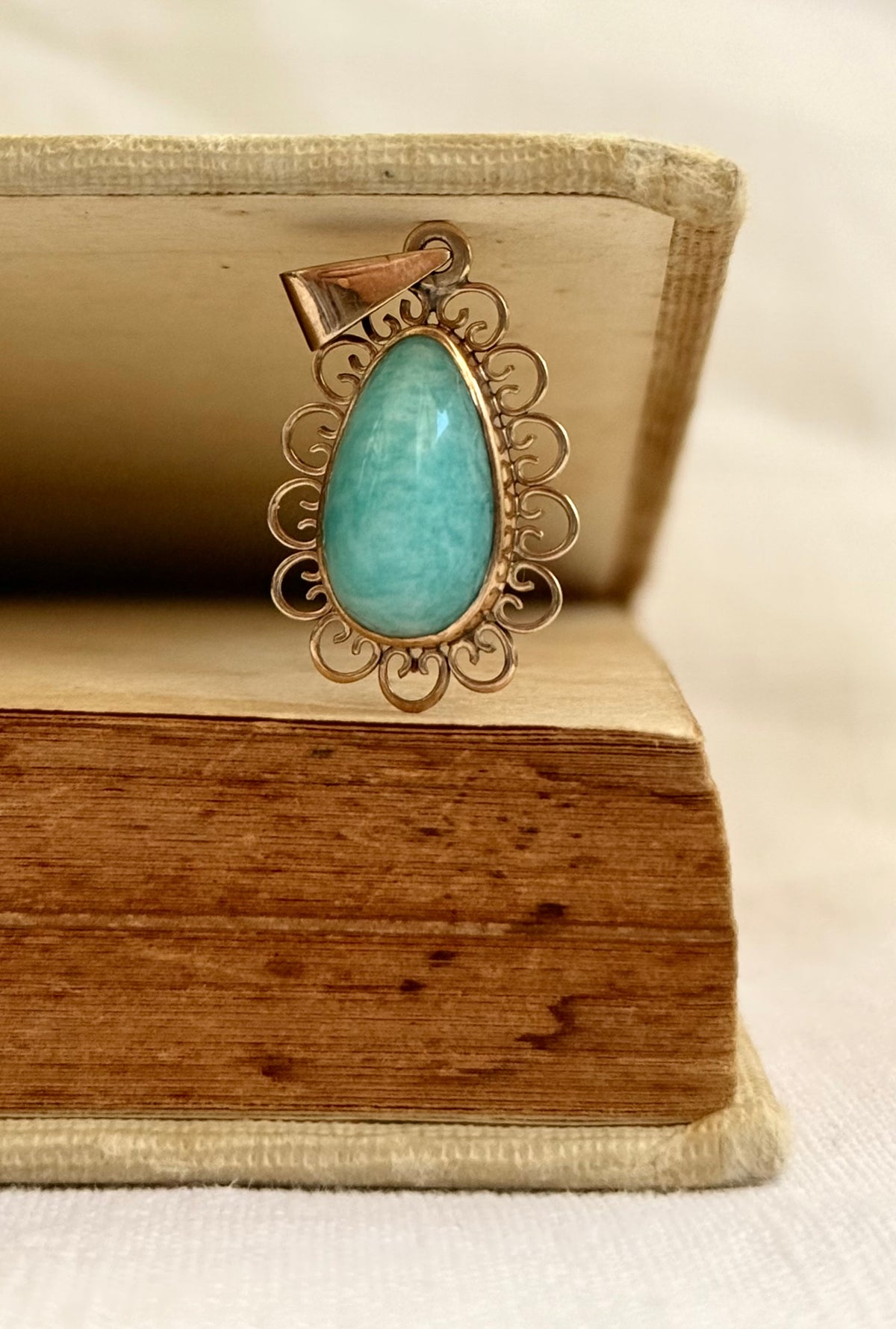 .1940s .1950s .375 .9ct gold Amazonite vintage yellow gold modernist teardrop pear shaped filigree scroll form frame blue green gemstone drop pendant.