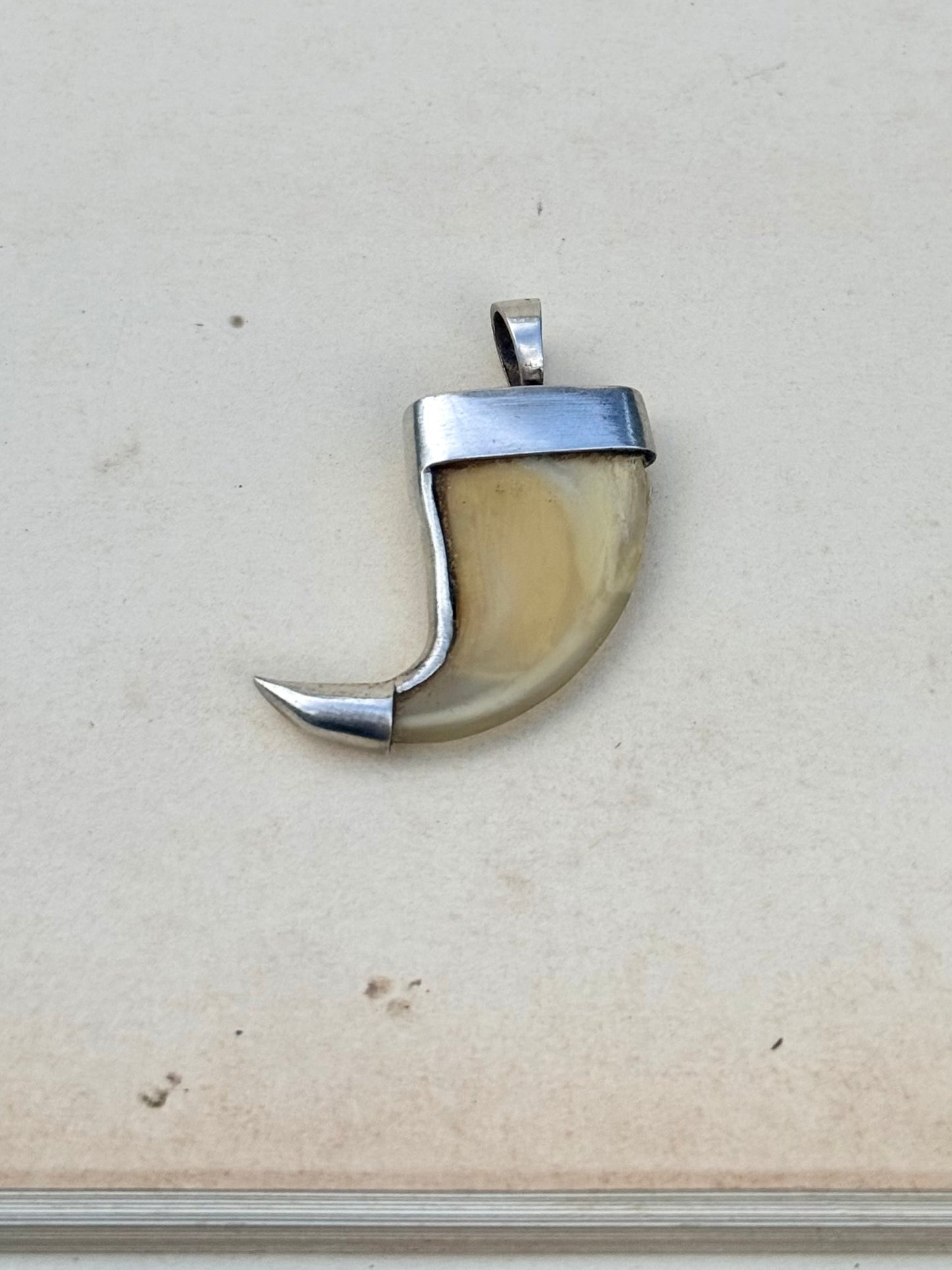 .925 silver Victorian revival lion claw pendant