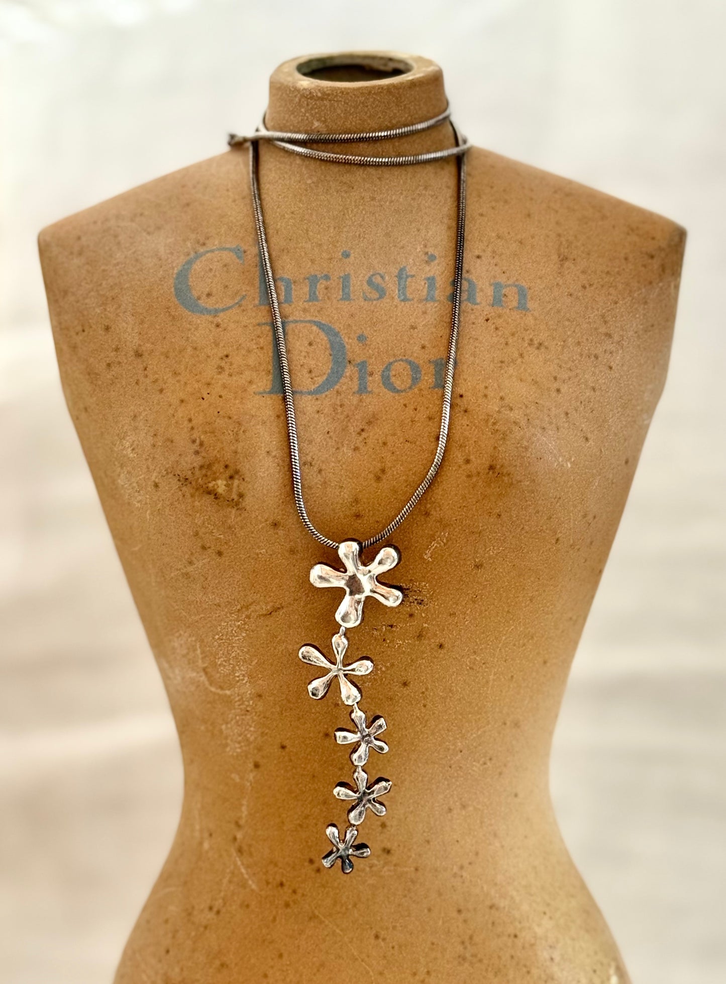 .925 .1950s revival modernist sterling silver floral waterfall drop pendant silver snake chain