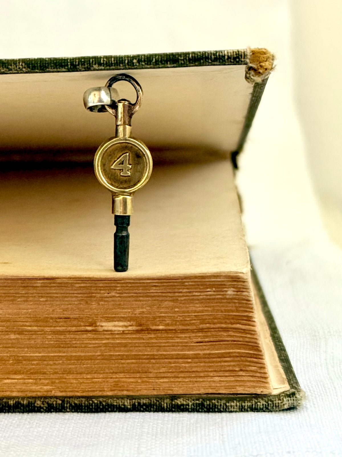 .1900s antique brass watch winder key number 4 collectors silver fob pendant