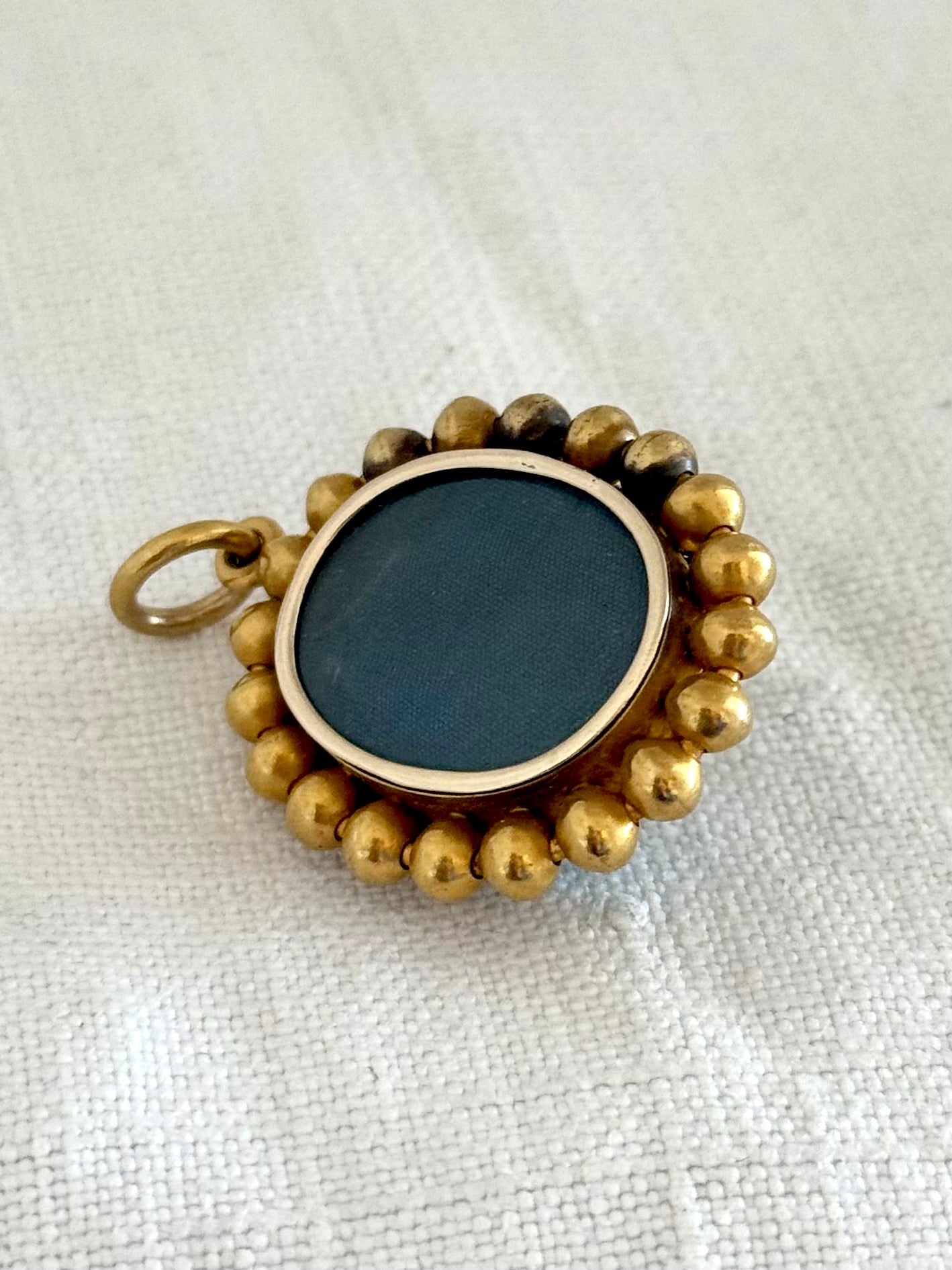 .15ct .1850s .1860s antique Victorian Yellow Gold Cushion cut Diamond Rose Cut Diamond star starburst Angel Coral and Blue Enamel Etruscan Revival Beaded border Mourning locket pendant