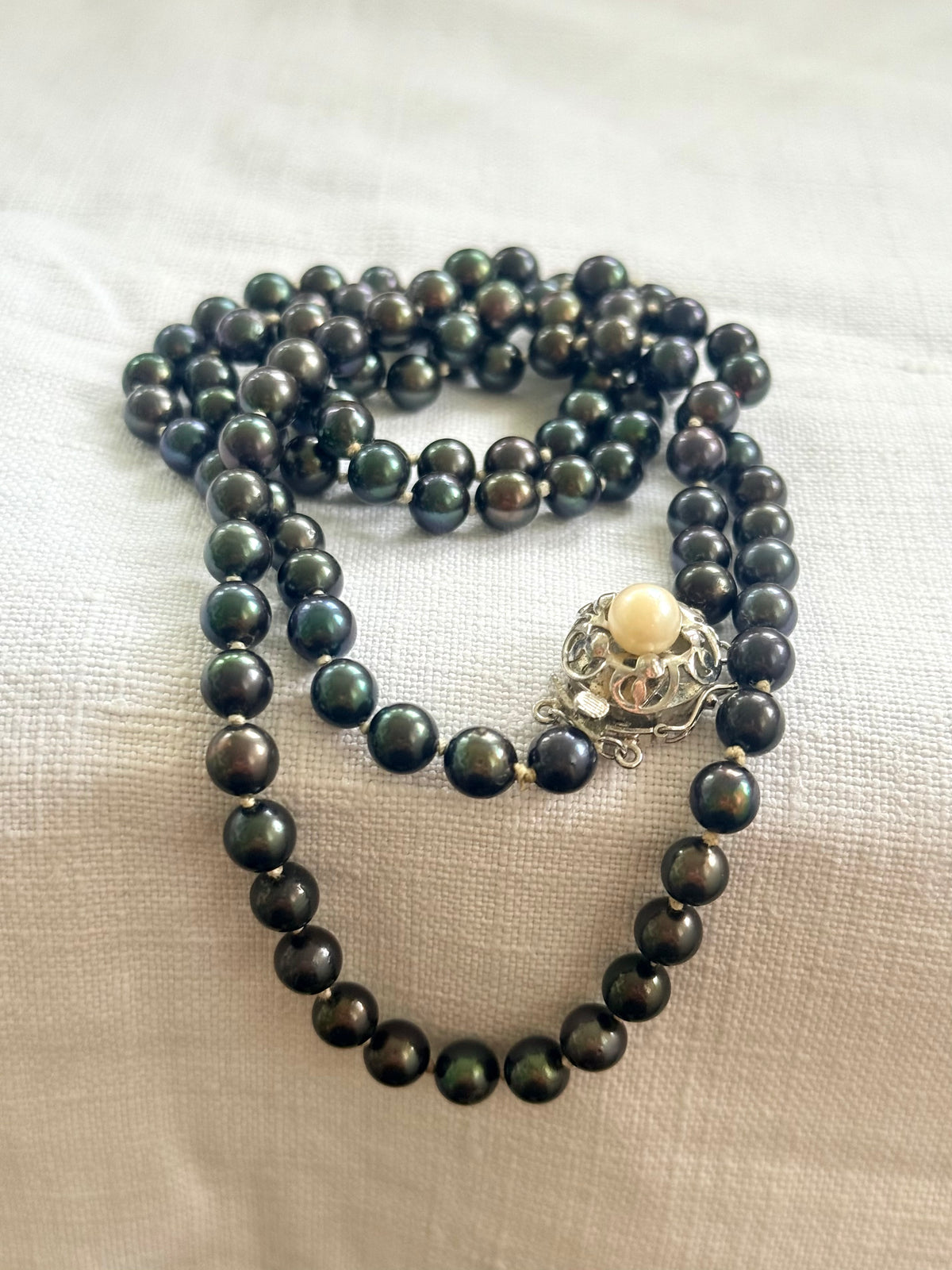 .925 .77.5cm long luxury cultured pearl real Tahitian purple petrol brown knotted Pearl necklace with floral sterling silver box clasp