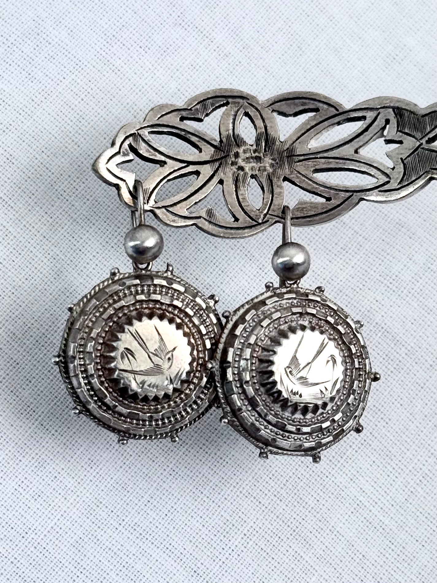 .1870s .1890s .925 Aesthetic Movement Etruscan revival rare and magnificent Victorian antique silver swallow bird sweetheart drop earrings